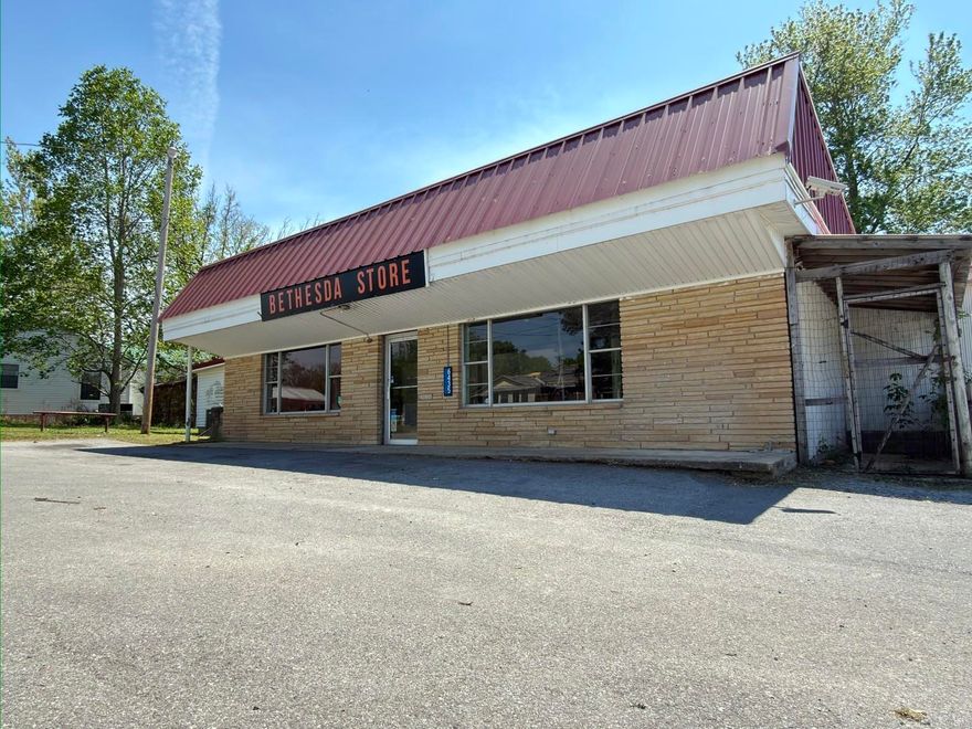 Iconic building in the heart of Bethesda that has quite the history in that small town! This large 2,256 sq. ft. storefront is priced to sell and ready for the next owner to reimagine what it's next purpose is. Formally the Bethesda Store, it has some of the existing features still in place such as a walk-in cooler and a covered outdoor pavillion, but the concrete structure can easily be modified to fit numerous business models. It's located on a .36 acre parcel with ample paved parking! You'll be hard pressed to find a building like this priced at under $50 a square foot, so check it out today!