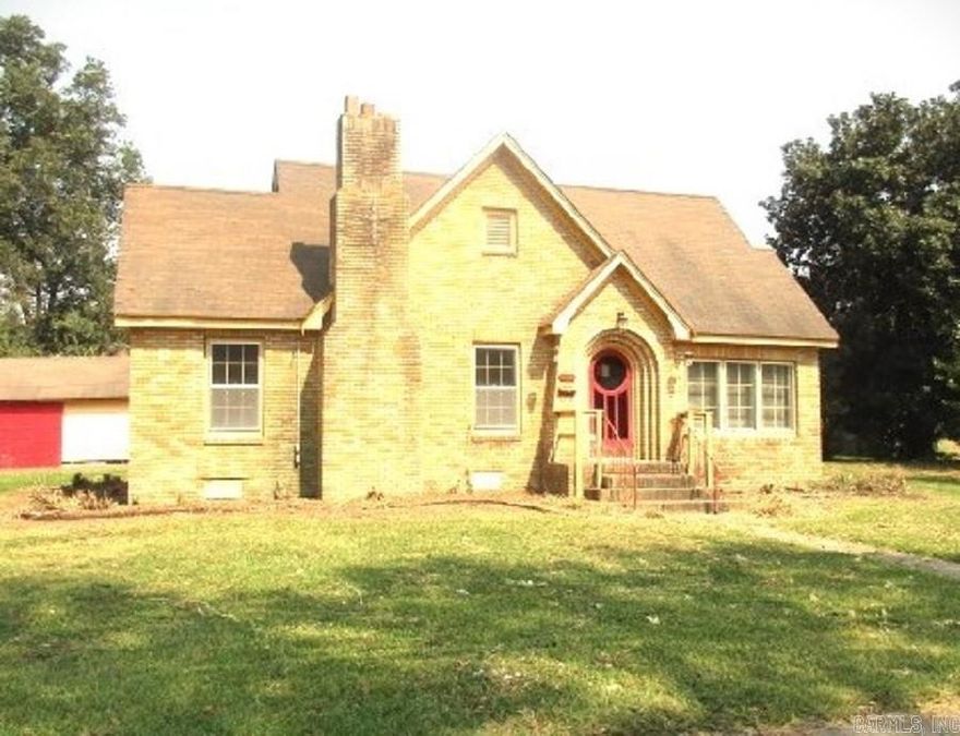 This home is a charmer.  It aways your personal touches to make it yours!!  Detached garage/shop.  Fireplace, archways and beautiful brick work.  Call today to schedule your tour.  Exact Age of home unknow.  Taxes are without Homestead Credit**Agents See Remarks**