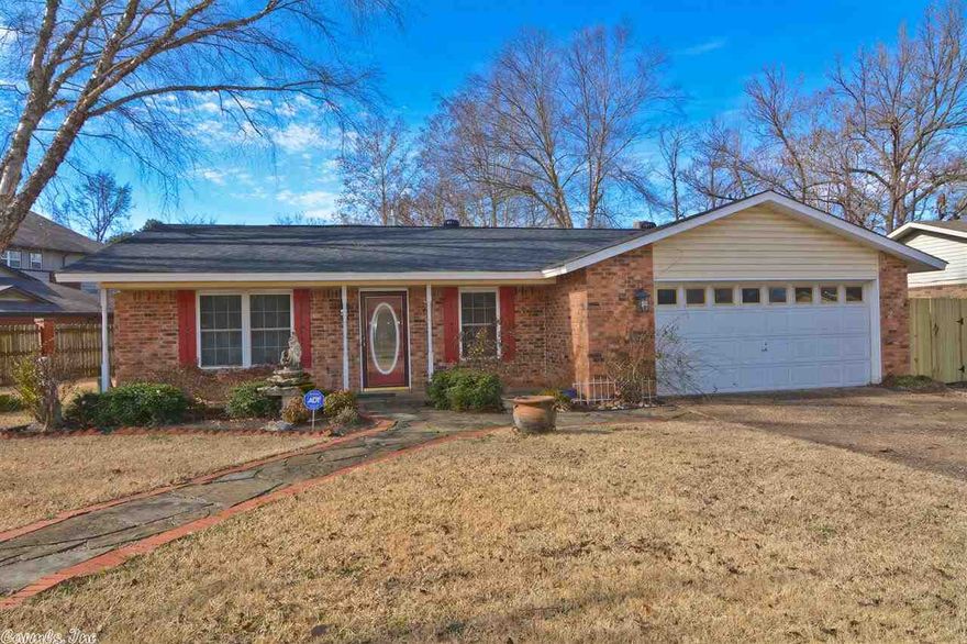 Great updated 3 bd/2 ba home with tons of extras. Dream kitchen with custom built wood cabinets, quartz counter tops, stainless gas stove with pot filler, dish drawer, and frig conveys. 2 living areas with an enclosed garage that can be converted back if wanted. Floors are hand scrapped hardwood, tile and brick. Large sun-room that overlooks beautifully landscaped backyard with coy pond and fountain. Storage building will convey.You must see this one to appreciate it! Roof 2 yrs old, heat/ac approx. 10 yrs