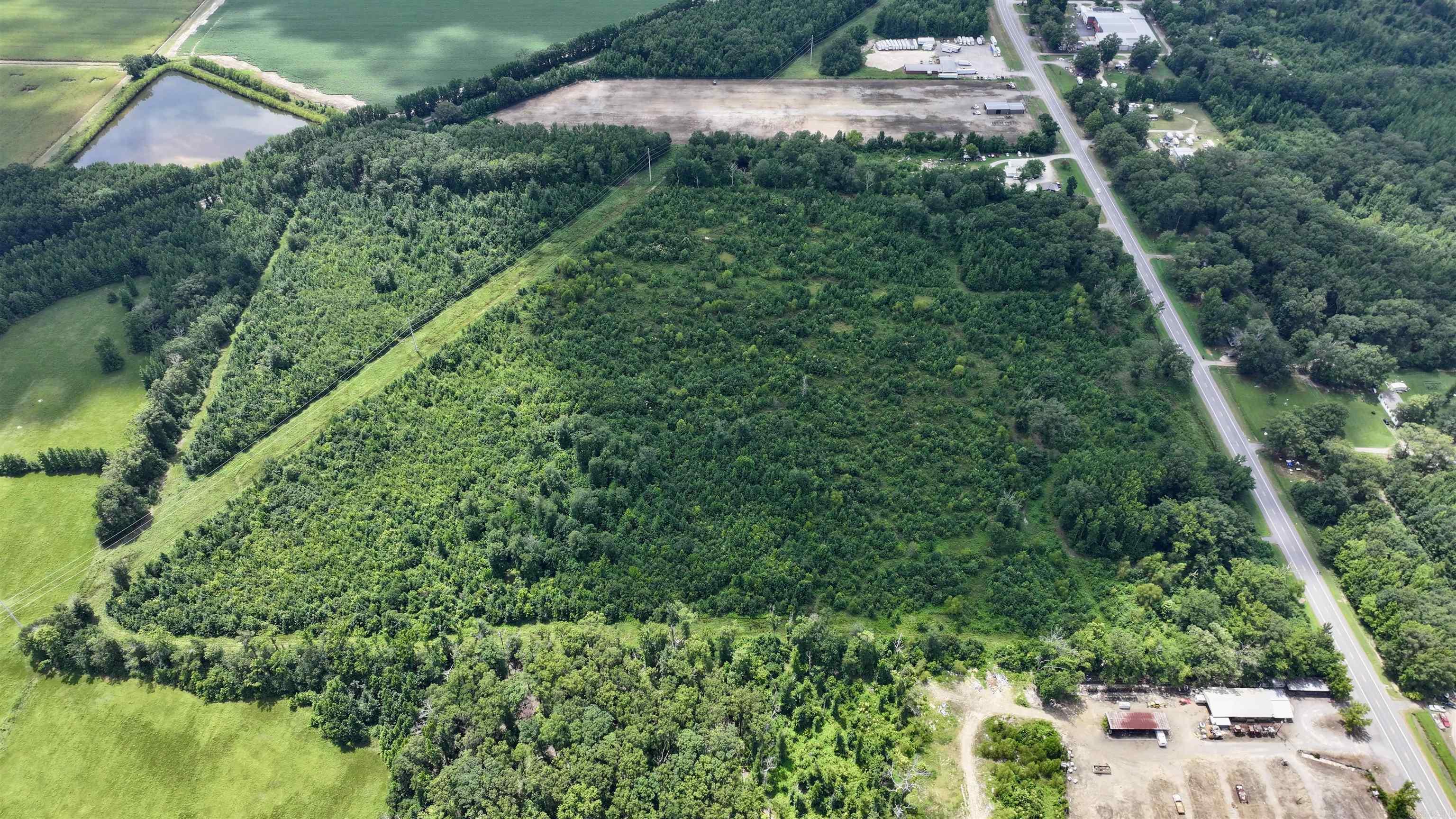 Discover the perfect blend of privacy, convenience and natural beauty with this 55.38-acre tract located just off old highway. Tucked away just minutes from town and amenities, this property offers an ideal escape without sacrificing accessibility. The land features level terrain for easy building, along with a mix of open space and mature trees, providing both scenic beauty and functional use. Whether you're looking to build your dream home, subdivision, hunting retreat, this versatile property is ready for a vision. This property most recent years use has been deer hunting.