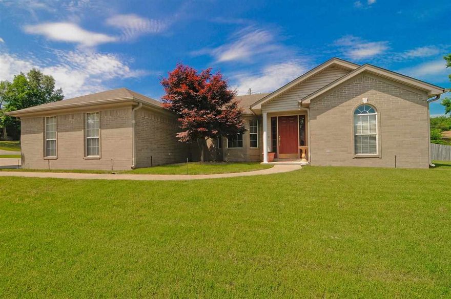 WONDERFUL FAMILY HOME: This 3 BR,2BA  All Brick Beauty is located in the Summerwood subdivision, split bedroom plan, open floor plan with a huge living room with a corner FP,open kitchen with beautiful stained cabinets, separate laundry room with lots of cabinets. Park pad for extra parking, outside storage building, privacy fenced back yard, sprinkler system.  There is a alarm system seller will turn off prior to all showings.