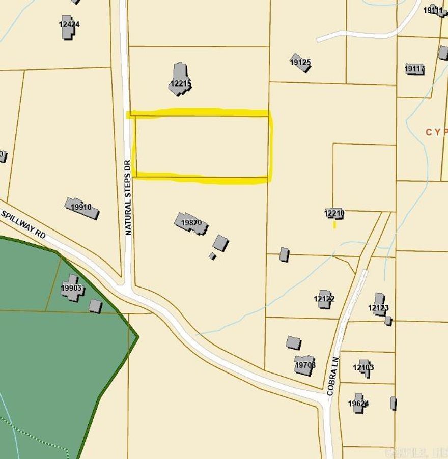 Residential lot located in an exclusive area of homes on acreage. This 2.34-acre, fully wooded property offers privacy and a natural setting. It may be purchased together with the adjacent property at 19820 Spillway Road, as it shares the southern boundary. Conveniently situated in the Natural Steps area, the lot is approximately 2.5 miles from Pinnacle Mountain State Park and about 5 miles from the Chenal Walmart. Access to the Ouachita Trail is just down the street.