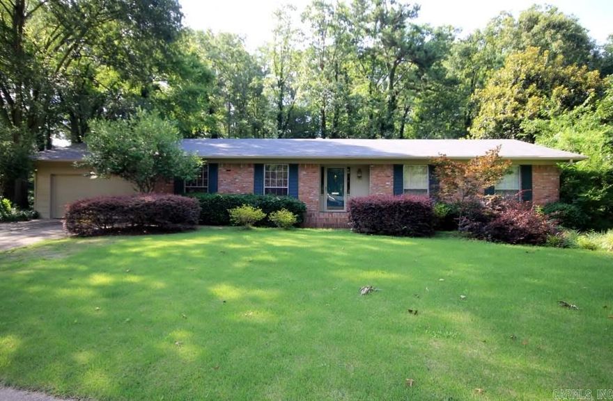 Lovely red brick one level lives like a patio home with no back yard.  Double flat deck for cookouts backs to beautiful shrubs and woods.  Knotty pine floored den.  Kitchen and baths remodeled by Schulte.  Built garage when remodeling.