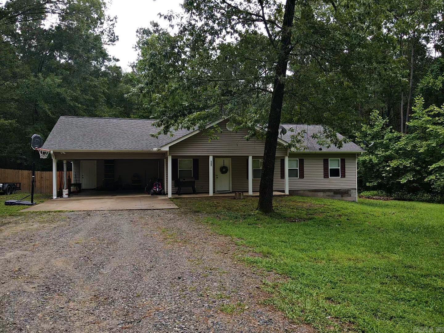 Come Take a Look at this Fabulous Property. Featuring a Home with 4 Bedrooms, 2 Bathrooms, Safe Room/Pantry, New floors throughout the living area and hallway. Step outside to a back deck and completely fenced in backyard. Newer Hot Water Heater and HVAC. Large 30X30, 900 square foot shop and an extra storage facility. Sitting on 3 acres. COME TAKE A LOOK FOR YOURSELF!