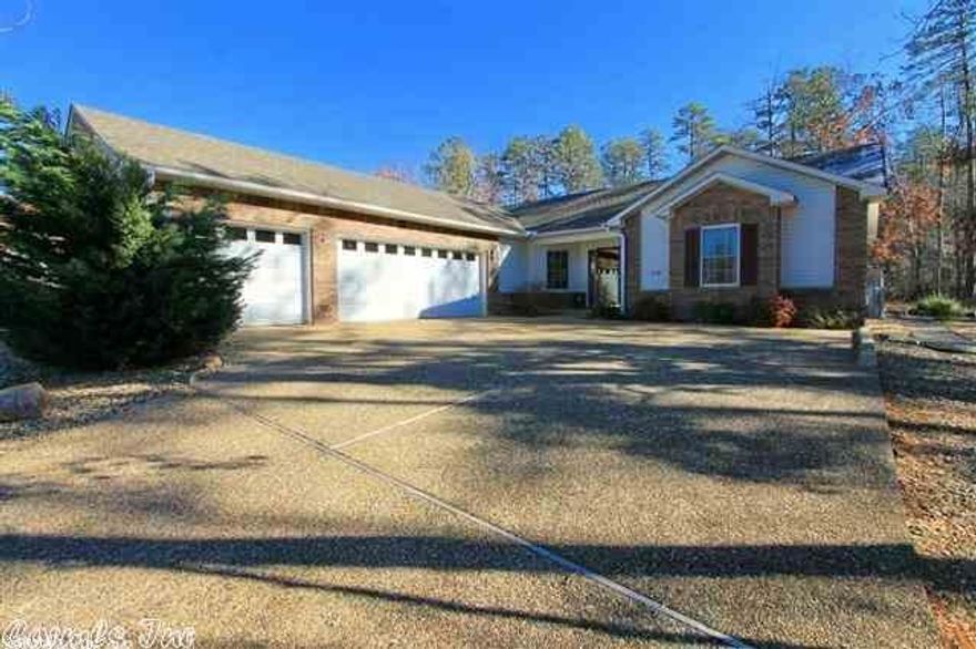 Extremely nice 3 bedroom 2 bath home across the street from Ponce de Leon golf course.  This home has been updated with granite counter tops, custom tile shower, beautifully landscaped back yard with a water feature and flagstone patio.  In addition, this home has a split floor plan and a 3 car garage with a full wall of built in cabinets.