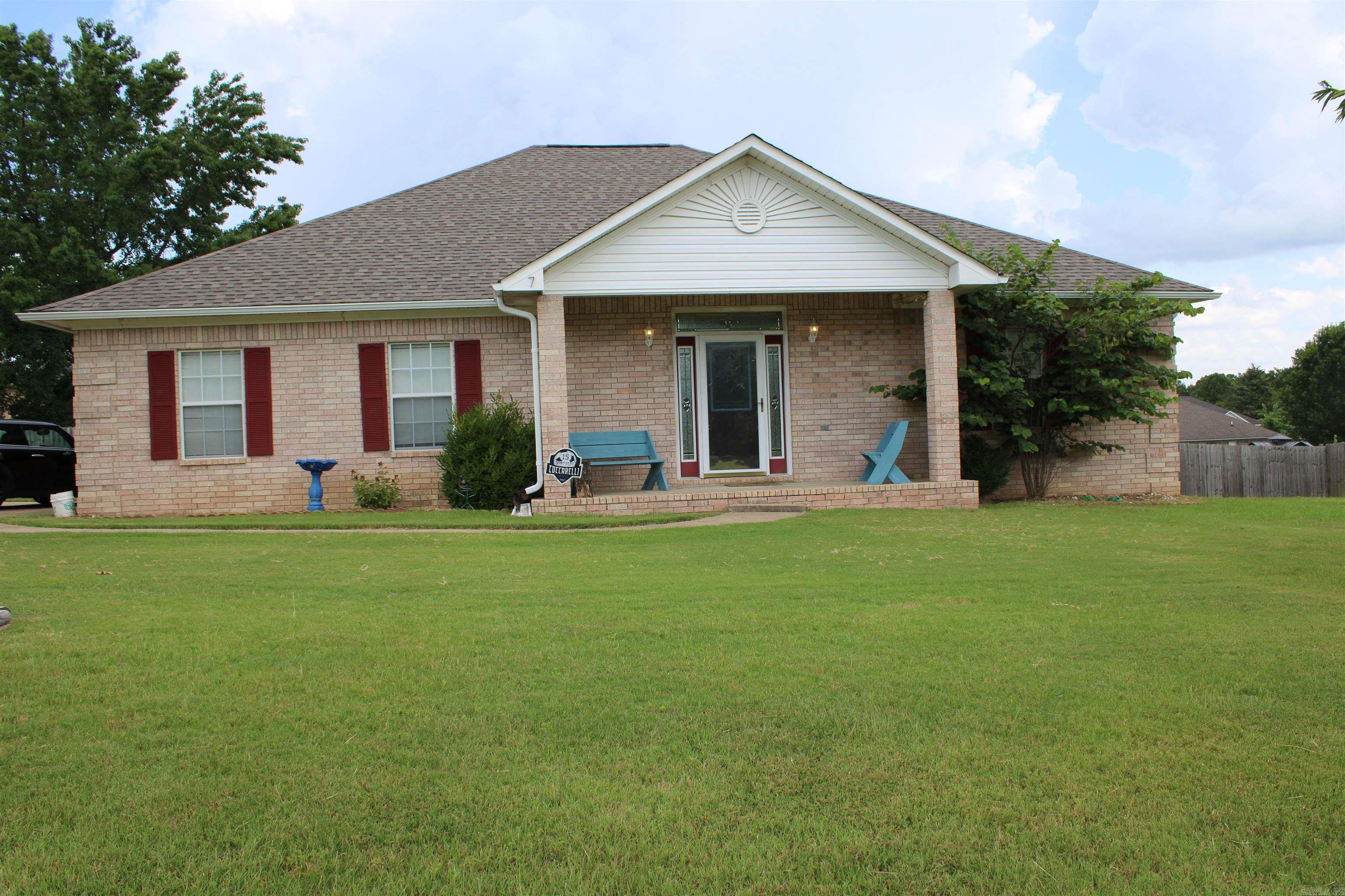 Are you seeking what most people call "home"? Well look no further! Welcome to 7 Cedar Knoll Loop! This beautifully maintained 4 bedroom 2 bath home sits on half an acre with a privacy fenced back yard. Inside, you will find your dream master suite, with a tastefully tiled shower with a jetted tub and a large linen closet. Adjacent to the bathroom, you will find the master closet, which is the size of most homes guest rooms. The living room is spacious yet cozy, offering ample room for your couches, or even a sectional! Also, the gas logs in the fireplace have been recently replaced with new logs! Moving into the dining room, you will find plenty of room for family or friends to enjoy a nice meal together! Opposite of the master suite, the three additional rooms offer an array of space for an office or additional bedrooms. A cozy kitchen with just the right amount of counter space and cabinet space. Entering the privacy fenced back yard, you will come out onto a wooden deck that overlooks the rear half of the acreage. The 10x16 wooden shed CONVEYS with the property! The generous seller is offering a $3000 flooring credit and a 1-year Homeowners Warranty! Agents see remarks!