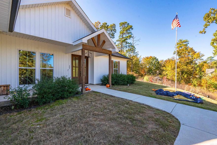 Almost new custom-built home in the Lake Hamilton School District! This 4-bedroom, 2-bath property features an open floor plan designed for easy entertaining and everyday living. The spacious living area includes a beautiful fireplace, while the kitchen offers plenty of workspace and modern finishes. Enjoy the convenience of an oversized garage and a location close to schools, shopping, and recreation. Move-in ready and built with attention to detail throughout!