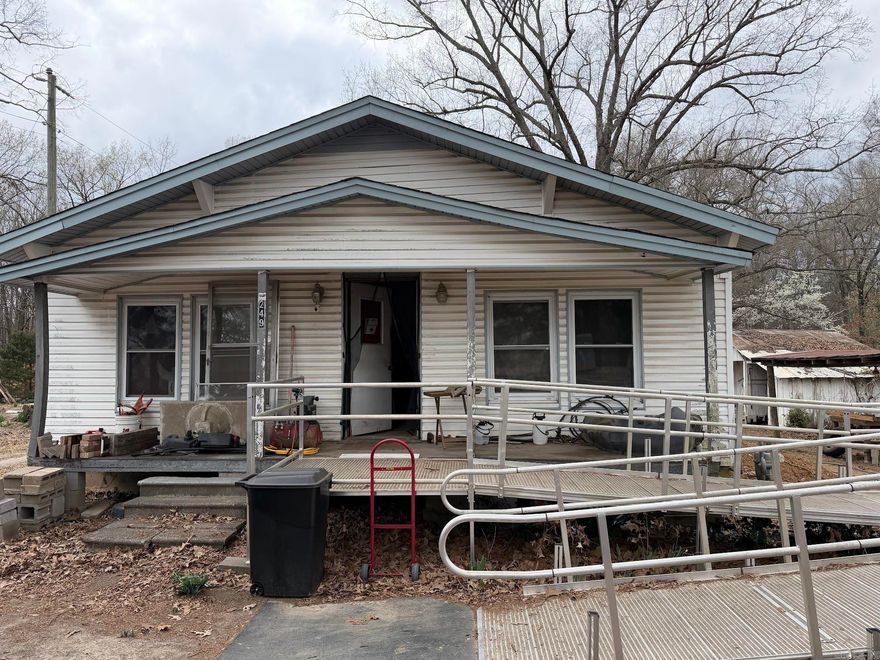 Opportunity awaits with this 2-bedroom, 1-bath home situated on over 4 acres of land! This fixer-upper offers the perfect chance to bring your vision to life and make it your own. With plenty of space to spread out, the property provides room for gardening, outdoor activities, or future improvements. Whether you're looking for a renovation project, an investment opportunity, or a place to create your own private retreat, this property is full of potential and ready for your personal touch. No seller property disclosure available. Buyers should verify lot size using their own measurements.