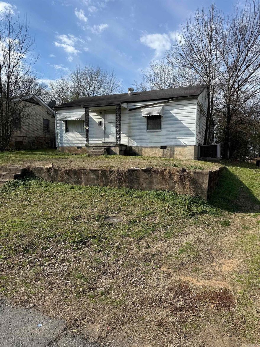 Older one owner home on large lot ,Super large den family room on back of house plus laundry room .House is in need of lots of repairs and sellers are wanting to sell it as is ,Estate sale and owners just want get it sold .Detached garage in back yard .