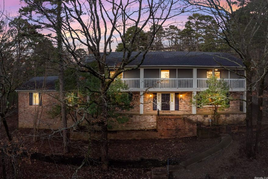 Palatial Pleasant Valley home tucked away with beautiful vistas overlooking treetops. Lovely dual-entry: convenient front, circular driveway and level back entry with two-car garage. The fluid space is an entertainer's dream. The substantially sized dining room allows for hosting large gatherings, spills into the living room, flows to library with wood-burning fireplace, and circulates to super spacious kitchen. Updated in the recent past, the beautiful eat-in kitchen is delightful. Stir cocktails in wet bar and pour wine from wine cooler or custom-crafted wine bins. The spa-like bathrooms are a welcome retreat at the end of a day. Separate downstairs bedroom with new bathroom is perfect for guests or quiet office. Enjoy peaceful days with a dip in your private, fenced in-ground pool, relax at the fire-pit or lounge on the lanai. Inclement weather won't deter you from the outside: sit in tranquility on the screened upper porch, or when too hot or cold, gaze out the huge picture windows in the library or living room. Never fret over power outages with a WHOLE HOUSE GENERATOR. Hardwoods and fresh neutral paint throughout most/new carpet in two bedrooms. Mere minutes to PVCC. Welcome!