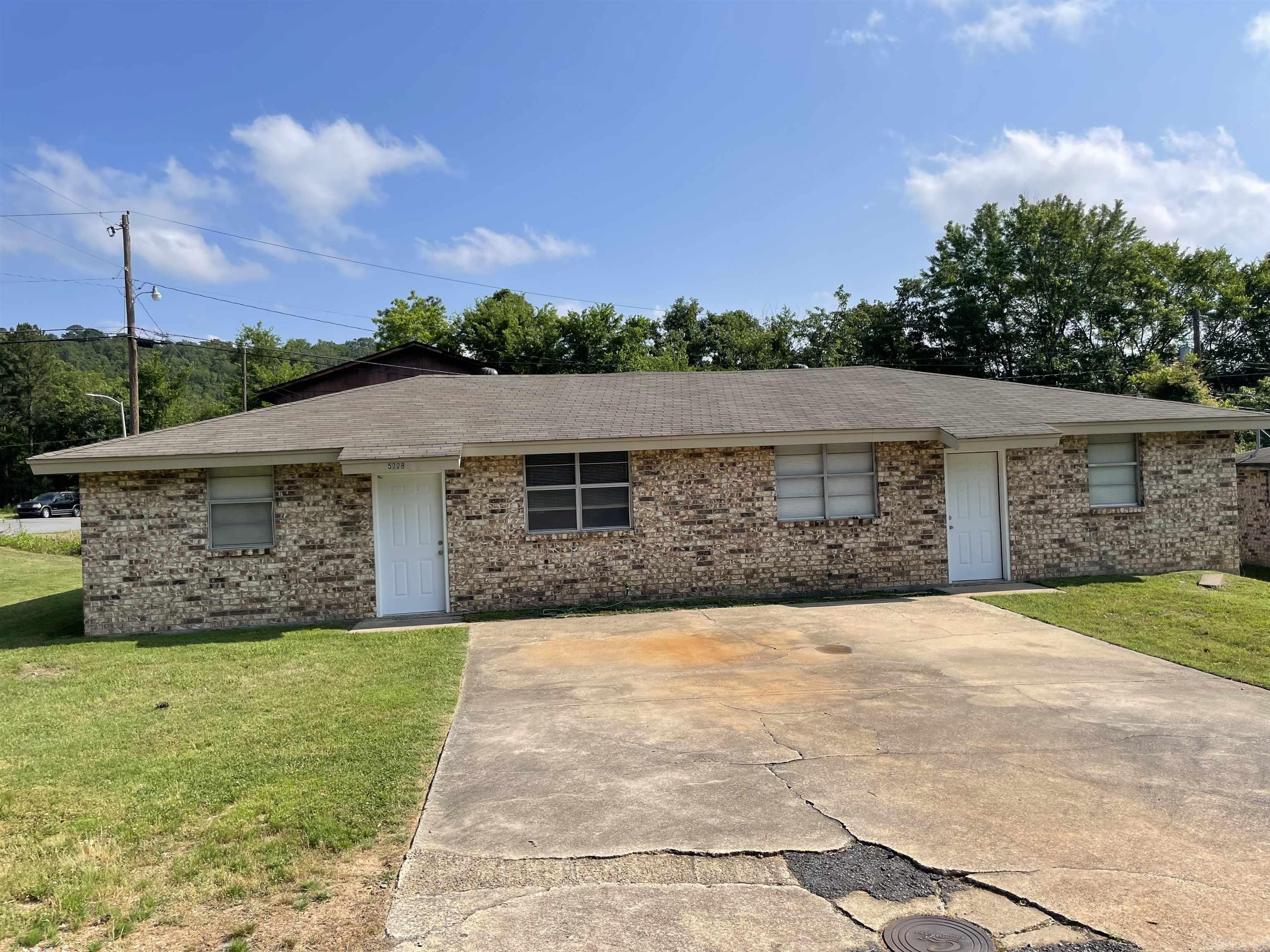Nice duplex close to Burns Park. Each unit has 2 bedrooms and 1 bath. New flooring and interior paint on both units. One unit has new countertops as well. Both sides are vacant and can be easily shown. Show your investors.