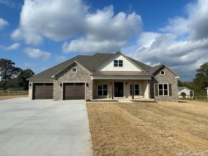 Sold before listed. Fabulous home with a great view! Massive back porch with mature trees in the backyard. The kitchen has quartz countertops and a stylish backsplash. Electric fireplace with a wallpaper accent wall and off centered floating shelves. Primary bedroom has a barn door to the primary bath. The bathroom is a true retreat. The tile wall is a statement maker with a walk through shower behind the wall. 2 separate closets. One of the closets joins the laundry room. As you come in from the garage you can hang your coat in the lockers. Pantry is hidden behind the barn door and there is also a half bath in this hall.