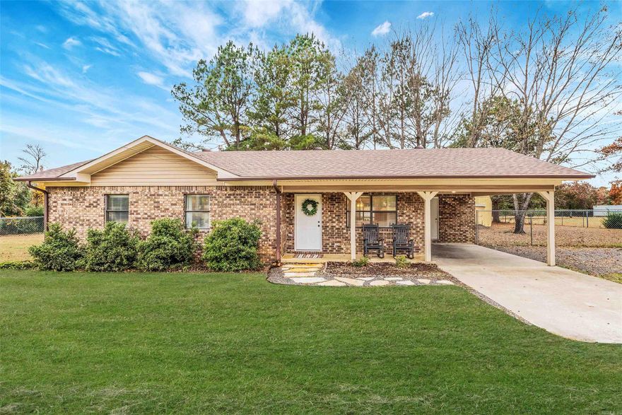 Come check out this adorable and cozy brick home, perfectly situated in one of the most convenient locations in town! Sitting on a spacious .62-acre corner lot, this property offers plenty of room to enjoy outdoor living with a fully fenced, large backyard—ideal for kids, pets, or gardening. Inside, you’ll find 2 bedrooms and 1.5 baths, plus an additional 300 sq. ft. sunroom that’s full of possibilities. Use it as a den, man cave, hobby room, or even a 3rd bedroom—whatever fits your lifestyle. The kitchen was beautifully remodeled in 2024, featuring modern shaker cabinets, built-in appliances, a gas stove, and sleek quartz countertops. At the same time, stylish LVT flooring was added throughout most of the home, giving it a fresh and updated feel. A new roof was installed in October 2025.  Located less than 1 mile from Walmart and Ozark Health, and only 5 miles from the Choctaw Marina and Campground on Greers Ferry Lake, this home offers the perfect blend of comfort, convenience, and outdoor recreation.