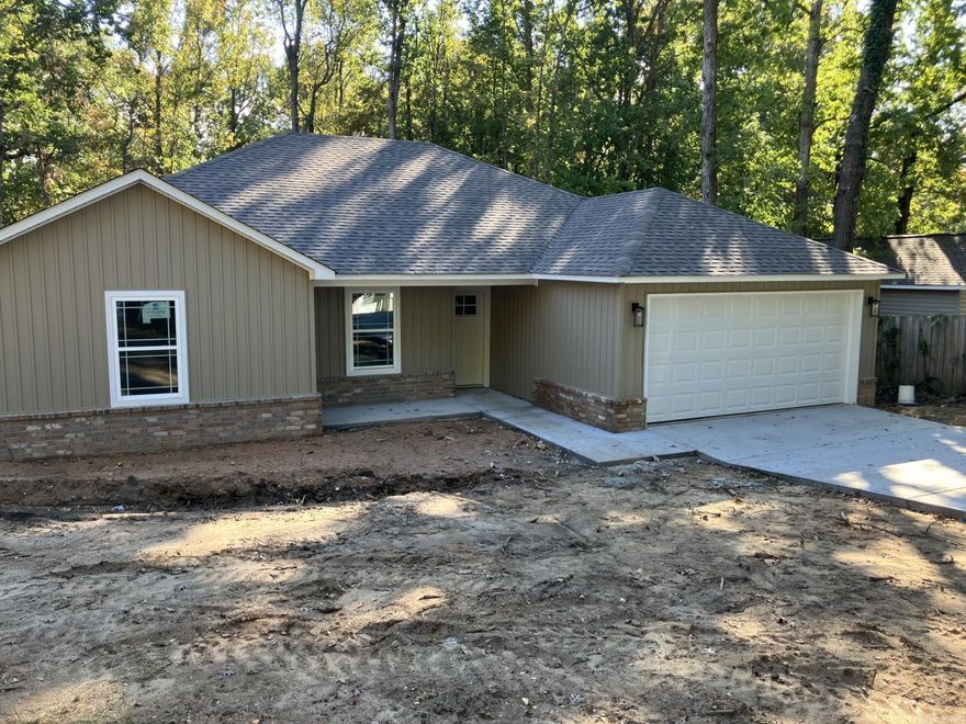 New construction! Four bedrooms! Spacious living room with vaulted ceiling, a stone surround corner fireplace and open to the kitchen/dining. Breakfast bar. All appliances and a pantry in the kitchen.