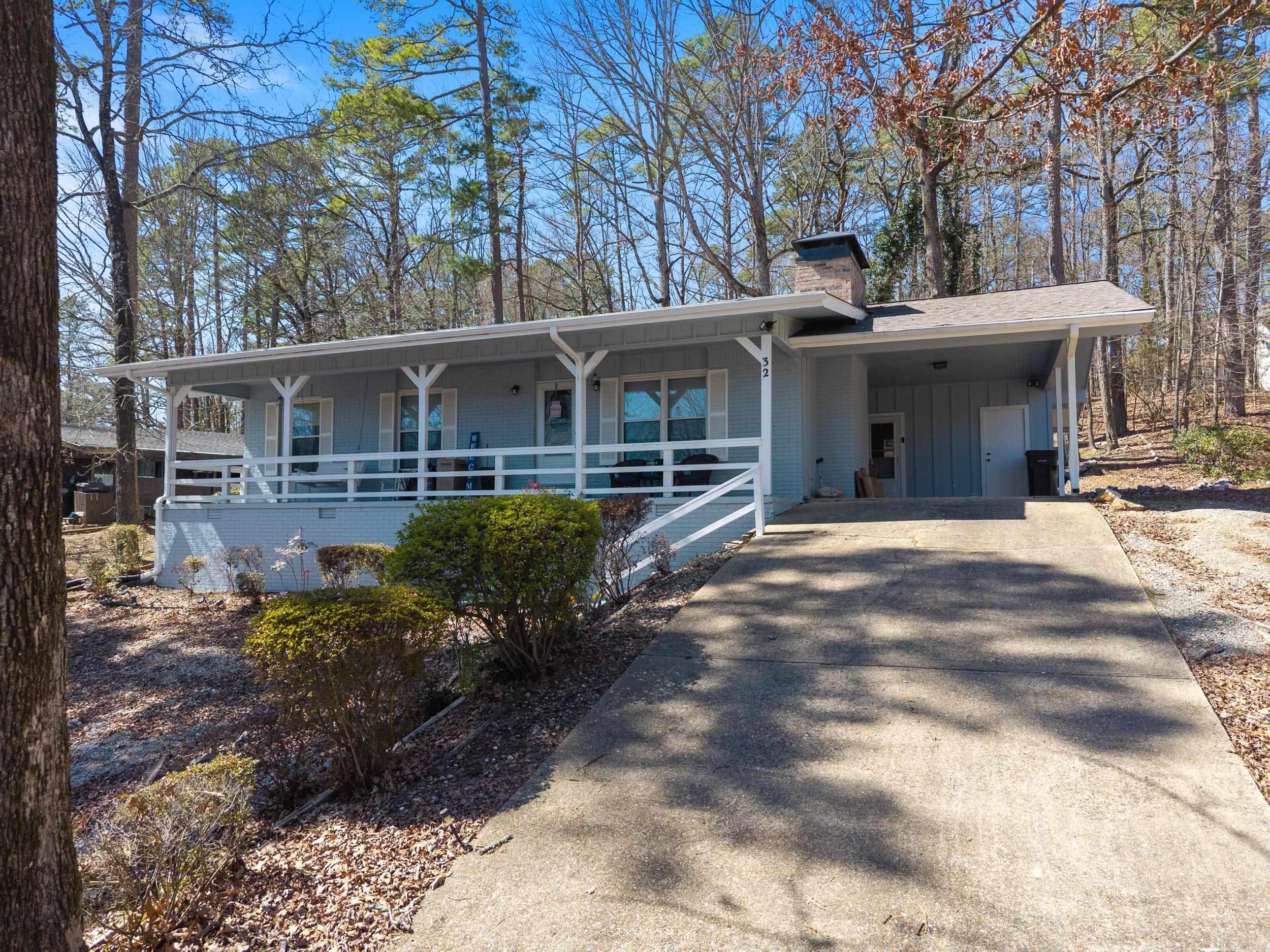Welcome home! This recently remodeled, 3-bedroom Hot Springs Village next to Lake Desoto offers expansive living spaces both indoors and outdoors, featuring a covered back patio! With its vaulted ceilings in the living room, carport, workshop, and ample storage, this single-story home has everything you need. The extended front porch provides a lovely view of Lake DeSoto. Plus, it's just minutes away from all the West Gate amenities, including golf, trails, lakes, marina, swimming beach, and more! Schedule a showing today!