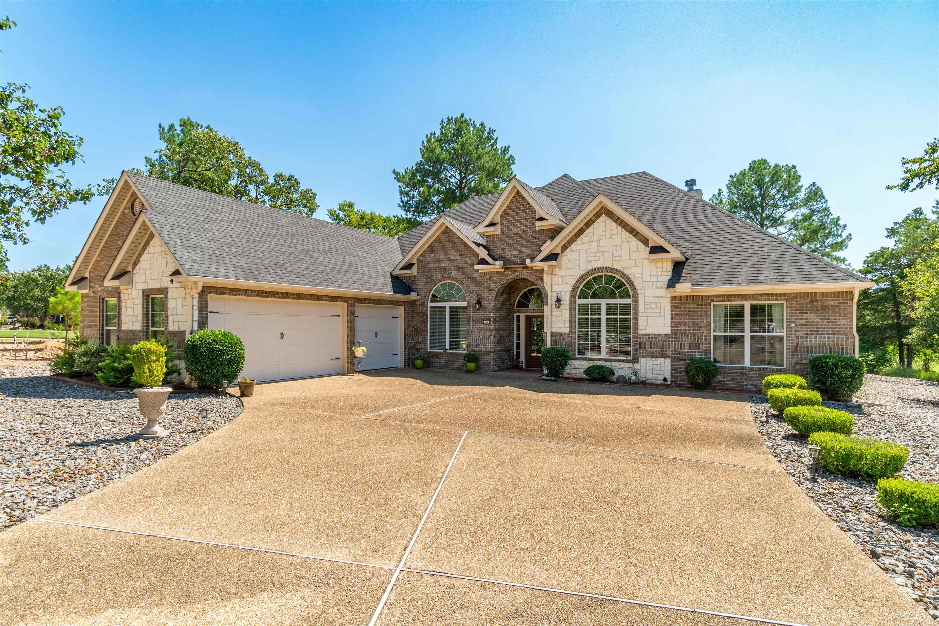 Beautiful Isabella Golf Course home built by Carriage Custom Homes with all the upgrades & special features of their homes - volume ceilings, open concept, divided bedrooms, hardwood floors, fireplace, large patio, one story, 3 car garage, great elevation & low maintenance landscaping. From the stunning curb appeal to the manicured golf view, or enjoying a starlit sky, buyers will relish the tranquility in this golfer's heaven! SEE AGENT REMARKS