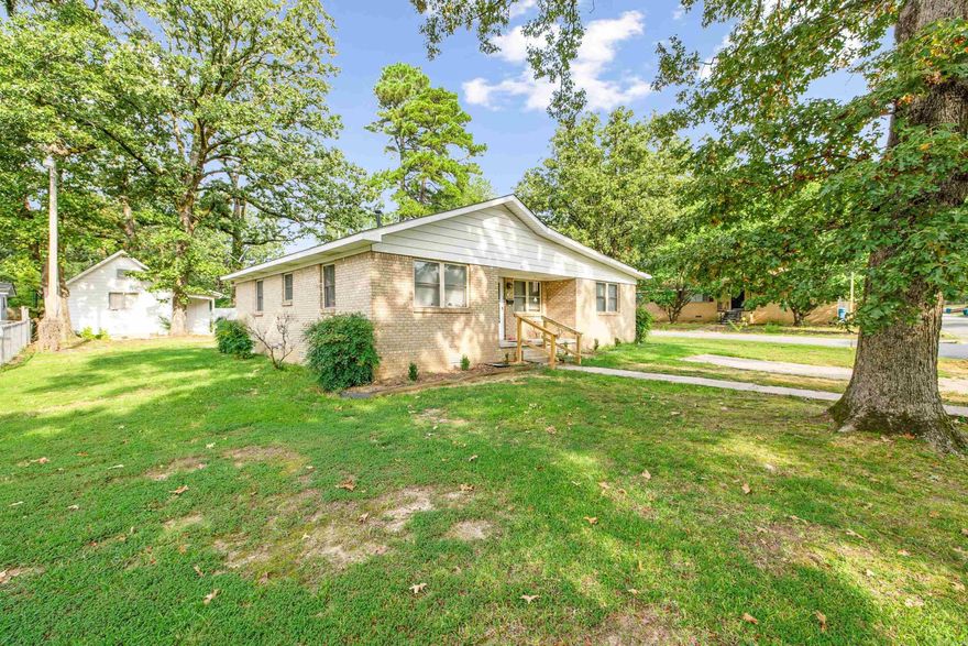 Welcome to this beautifully remodeled 3-bedroom, 2-bathroom home at 3100 Alameda Drive, offering approximately 1,465 square feet of modern comfort paired with original character. Completely reimagined, the home features an open floor plan, fresh new flooring, new windows, and fresh coat of paint throughout—just moments from the University of Arkansas at Little Rock. Entertain in style with gleaming quartz countertops, brand-new appliances, and sleek, contemporary light fixtures and hardware. Outside, enjoy the rare convenience of a corner lot complete with a circle driveway, additional parking, a generous storage shed, and thoughtfully designed landscaping. Recent mechanical updates include a hot water heater installed in 2023 and an HVAC system only about six years old. Ideally located within reach of UALR and excellent local schools, this move-in-ready gem offers unmistakable value