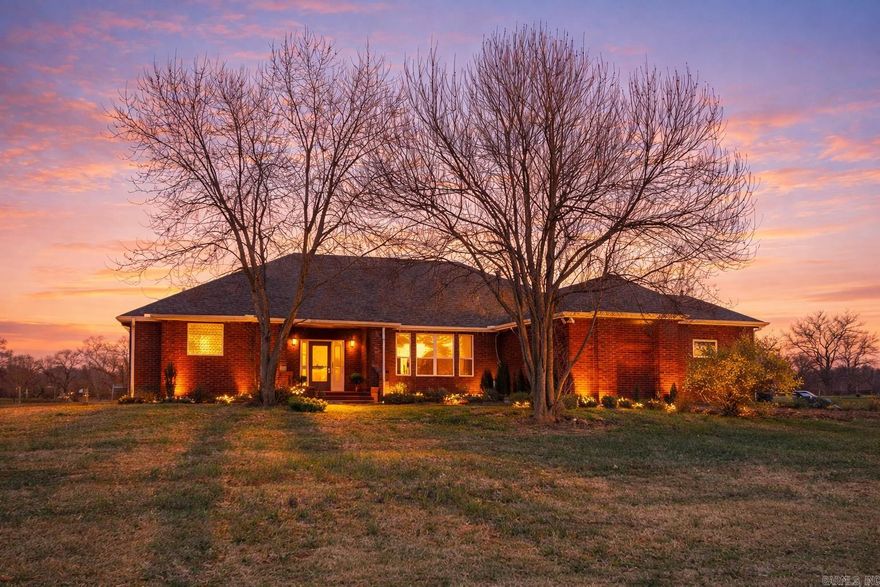 Welcome home — where life slows, the air feels sweeter, and every day feels like a retreat.  Set on 20.18 stunning acres, this 4-bedroom, 3.5-bath estate offers peaceful country living without sacrificing convenience. Soaring 12-foot ceilings, warm natural light, and a wood-burning fireplace create an inviting atmosphere, while the heart-of-the-home kitchen flows seamlessly into spacious living and dining areas made for gathering.  Step outside to a patio overlooking open fields and beautifully maintained grounds. With gardens, greenhouse, barn, pond, animal areas, a solar-powered well, and whole-home generator, the property is perfectly suited for a self-sustaining lifestyle.  Private, peaceful, and close to town — this isn’t just a home. It’s a place you’ll never want to leave.  If you have been searching for a home that feels like a retreat—where you can step away from the noise without sacrificing convenience—this 20.18-acre estate is ready to welcome you. Spacious, warm, and endlessly versatile, it offers everything you need to live fully and freely.  This is more than a home. It is a lifestyle, a sanctuary, and a dream waiting to be lived.