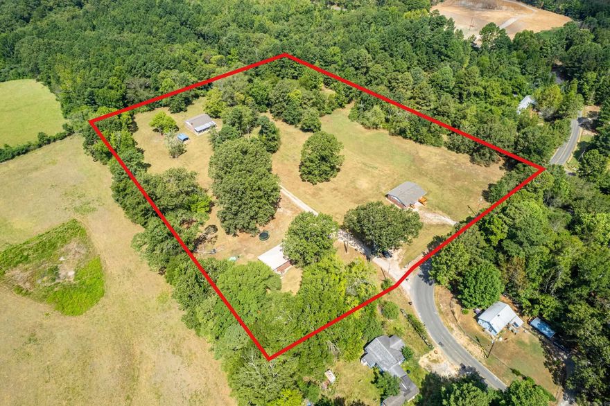 3 homes on over 7 1/2 acres! Beautiful country setting in Lake Hamilton School District. Live in one of the homes and lease the other two. Plenty of room to build more homes. Mobile homes are allowed. Lots of options! Currently, all three are leased. Two - 3/2 One - 2/2.ATTENTION INVESTORS-GREAT PROPERTY TO ADD TO YOUR PORTFOLIO! First home on the right 3/2 has been remodeled. New Roof(replaced decking as well), New HVAC, gas heat(natural gas) electric cool, New cabinets in kitchen and bathrooms, new kitchen countertops, replaced windows and doors. New carpet in one room. The 2nd home 3/2 all electric(new roof) and third home is 2/2 all electric.