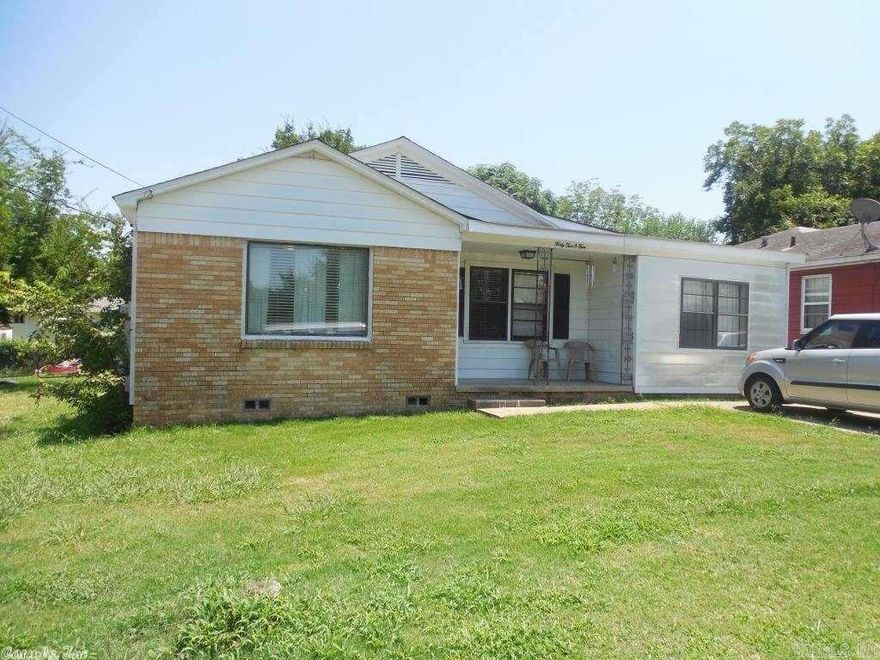 Here is your nice home right across the street from Moss Park. This 3 bedroom and 1 large bath has a formal living room with beautiful wood floors and a den with a fireplace and a separate laundry room. It has beautiful wood custom cabinets in the kitchen with a bar and a dining room. Fenced in back yard with a shop. Must see this nice home, priced to sell. Sq ft is approx., measuring encouraged. Motivated seller, bring all offers.