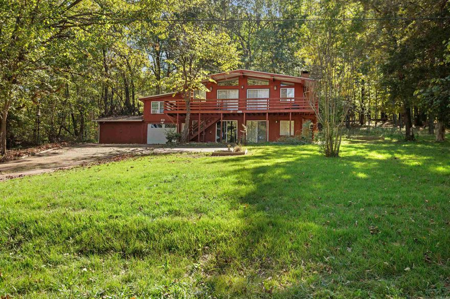 Location, Location, Location!Just a few short steps from the beautiful South Fork River where you can fish, kayak, float, or simply relax and take in the peaceful scenery. From your front door, you can see the North Golf Course—hop on your golf cart and ride over for a day on the greens! This charming home is currently being used as an Airbnb and offers both comfort and convenience in a perfect location. Step inside to a cozy living room that welcomes you with warmth and updated charm, creating an inviting space for any lifestyle. The home also features a fun game room, ideal for entertaining family and friends. Outside, you’ll love the spacious deck with amazing views—perfect for morning coffee or relaxing evenings surrounded by nature. Whether you’re looking for a vacation retreat, investment property, or full-time home, this one offers the best of Cherokee Village living!  Call today for you private tour!