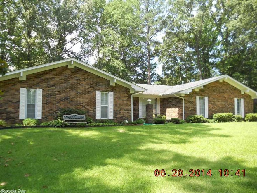 FOUR BEDROOMS!! Hard to find in Monticello especially for this price. This home sits on a tree shaded lot and a half in Western Pines Subdivision. Nice workshop, fenced backyard, 2 car GARAGE, brick home. There are four nice sized bedrooms, 2 baths, a large laundry with cabinets and sink. Open floor plan for kitchen, dining and den. Plus a room off the front entry for a sitting room or office. Gas fireplace in the den. The owner has continously monitored/maintaine the foundation & no fractures are evident.