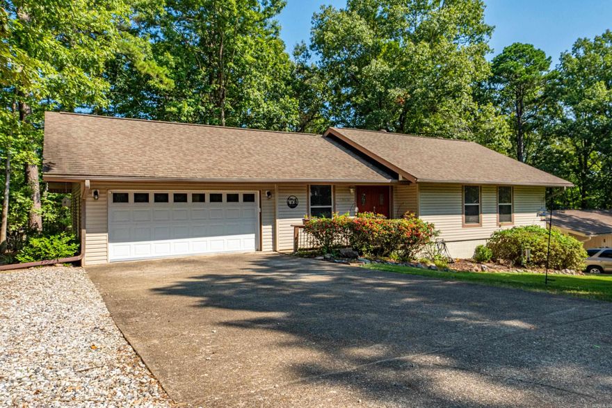Welcome to this spacious and versatile 4-bedroom home with a bonus flex room! The main level features a comfortable layout with a primary suite, two guest bedrooms, and a full second bath. The inviting living room is perfect for relaxing or entertaining and flows seamlessly into the kitchen and dining area. Refrigerator washer and dryer convey! On the lower level you’ll find a second living area, a private 4th bedroom, a flex room, that could serve as a fifth bedroom, office, or hobby space.  Spacious laundry room complete with extra storage.  The patio deck is expansive and morning coffee comes with a birdsong and an occasional deer siting!  With plenty of room for everyone and thoughtful features throughout, this home combine comfort and convenience