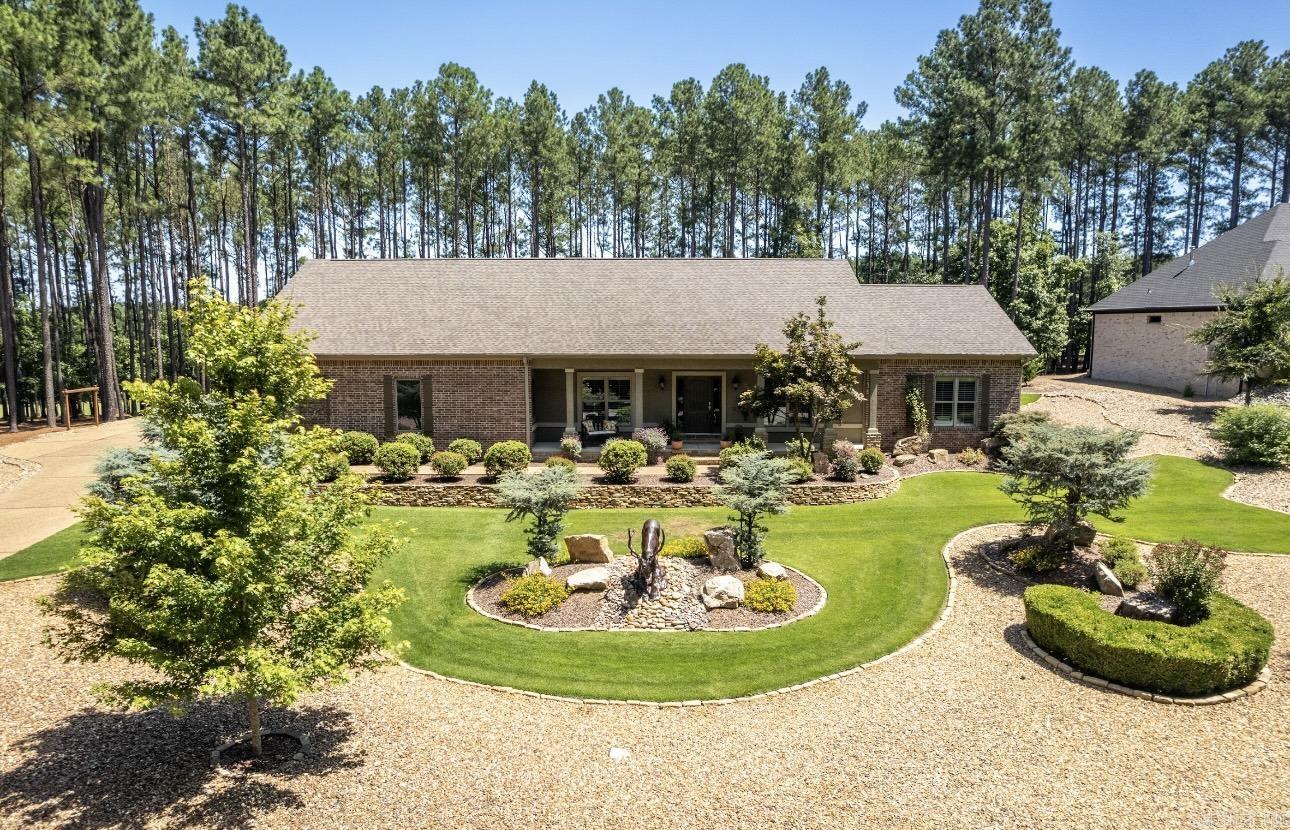 Beautiful 3-Bedroom, 2-Bath Home on 1.04 Acres (approx.) Near Granada Golf Course Enjoy the next chapter of life in this immaculate, move-in-ready home designed for comfort and ease. Nestled on 1.04 (approx.)serene acresāmade up of three combined lotsāthis 3-bedroom, 2-bath gem is just moments from the scenic Granada, Isabella and Diamante Golf Courses near the East gate of Hot Springs Village. You'll love the beautifully landscaped yard, low-maintenance living, and peaceful surroundings. Unwind in the screened-in porch featuring a cozy wood-burning fireplace, or sip your morning coffee on the inviting front porch. The private backyard offers a quiet, park-like settingāperfect for relaxing or entertaining a few friends. Whether you're an avid golfer or simply looking for a quiet, welcoming community, this home will be the perfect for you.