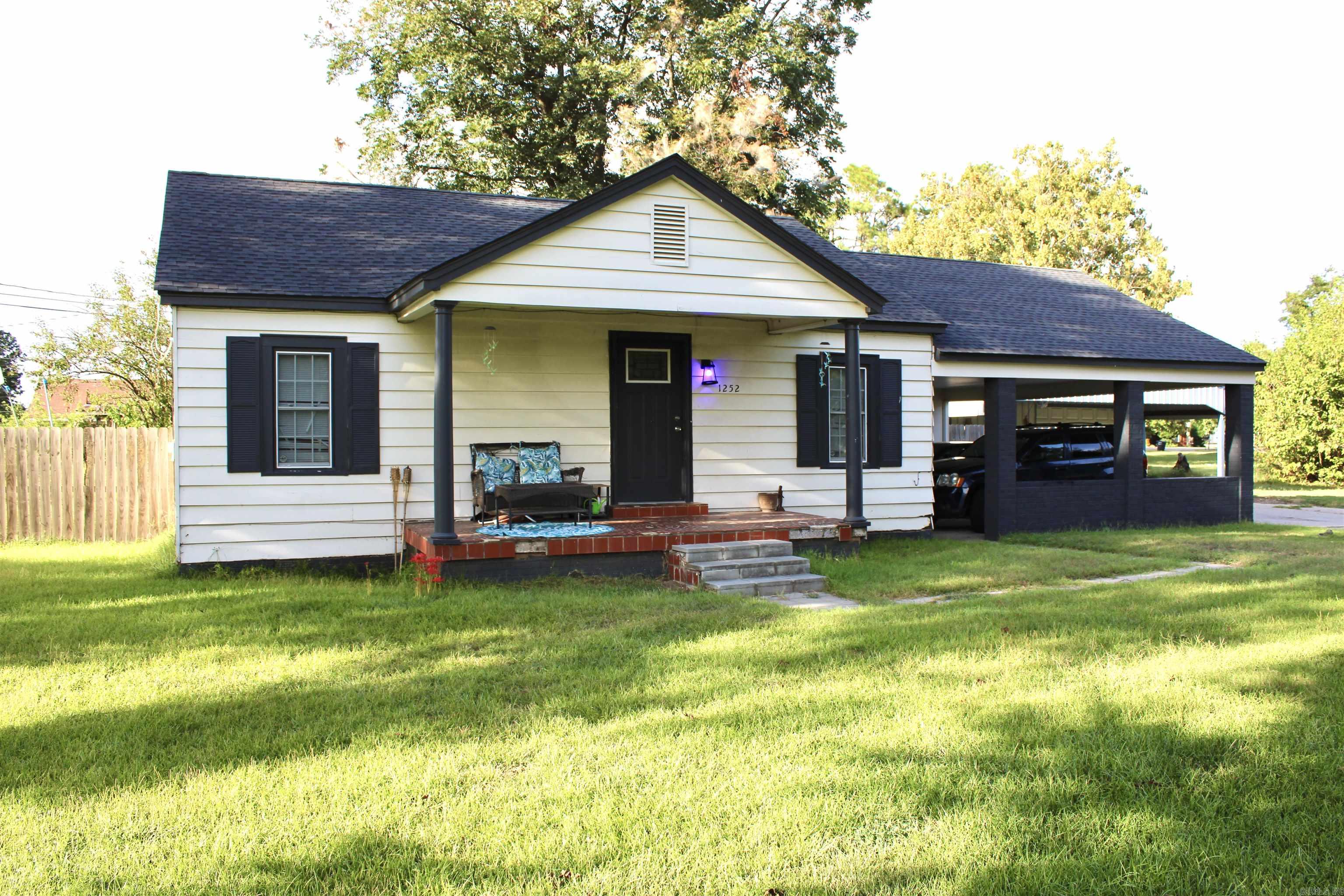 Charming 3-bedroom, 2-bath home in Trumann on a spacious 0.6-acre lot. Features a large detached shop with a garage door, electricity, and a concrete foundation perfect for projects or extra storage. The fenced yard offers privacy and outdoor space, with easy access to Highway 69 Blvd for convenience. A great opportunity for comfort and functionality in a peaceful setting!