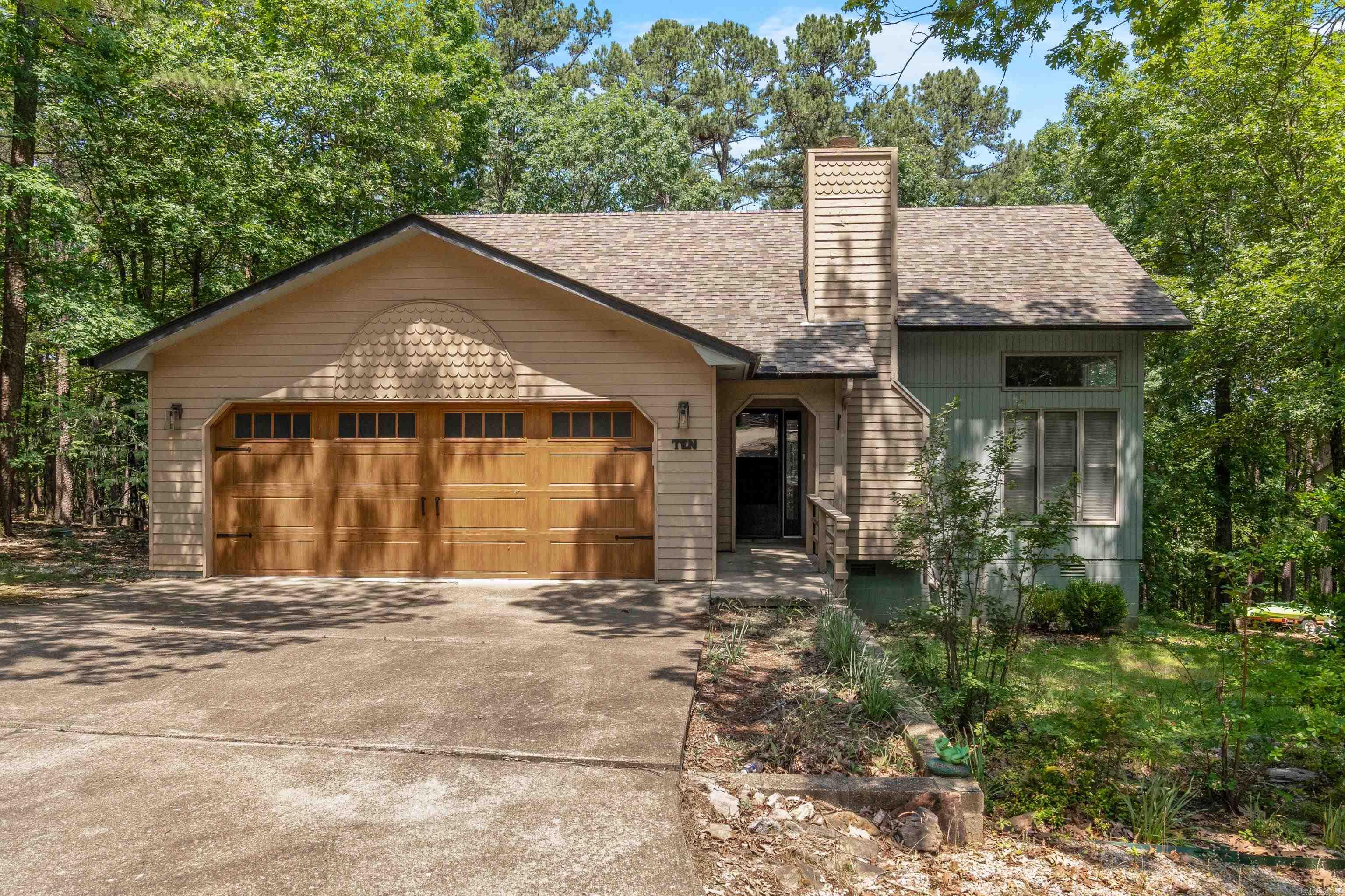 Welcome to your dream retreat! This beautifully maintained 2 bedroom, 2-bath home offers the perfect blend of comfort, charm and convenience. Located just minutes from grocery stores, restaurants and shopping centers, you will enjoy the West side amenities of Hot Springs Village. The home offers plenty of natural light, thanks to stunning skylights that add warmth and brightness throughout. It features a versatile bonus room-ideal for a home office or craft space giving you flexibility to suit your lifestyle. Enjoy your morning coffee or evening unwind in the screened-in porch, perfect for year round relaxation. You will also find a workshop and extra storage on the lower level with an encapsulated crawlspace! Don't miss this rare opportunity to own a gem in the largest gated community in the nation! Schedule your private showing today! Home is sold as-is, with no repairs or concessions to be made by the seller.