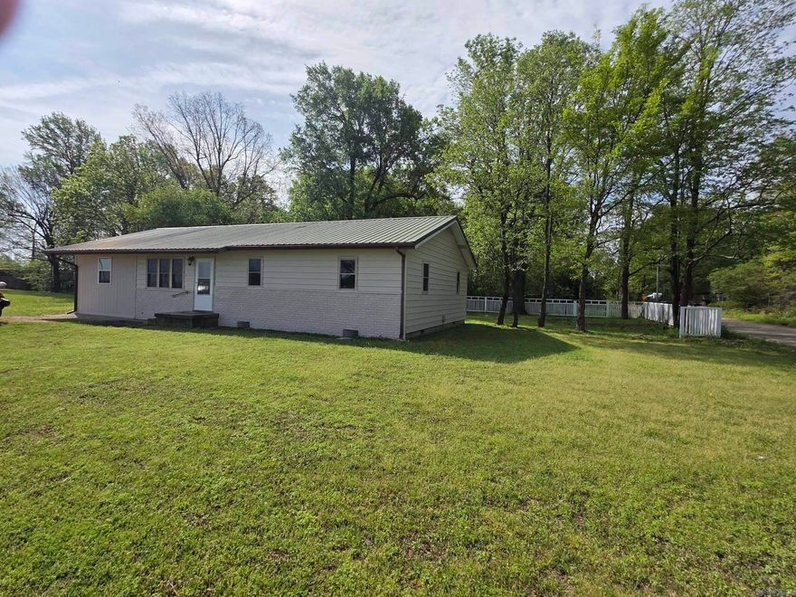 Great price on this 4 bed, 2 bath home sitting on a large 0.55 +/- acre corner lot right off Hwy 412/Greene 946. Approx. 1,600 +/- sq ft with big-ticket updates already in place including a metal roof, vinyl windows, updated breaker box, and new HVAC. Interior features a mix of LVP, hardwood, and vinyl flooring with a functional layout, plus a screened-in porch and partially fenced yard. Seller offering up to $2,500 in closing costs, termite clearance, and providing a home inspection with repairs completed. Buyer can always perform their own inspection with an inspector of their choice. Flood insurance required with current quote around $468/year through Shelter. Solid home with major improvements already handled—come take a look before it’s gone.  This home has undergone a pre-listing inspection, and any identified repairs are currently being completed. Buyers have the right to hire their own inspector or conduct inspections at their discretion. The pre-listing inspection is provided for marketing purposes only and to help ensure the home is safe, affordable, and in normal working condition.