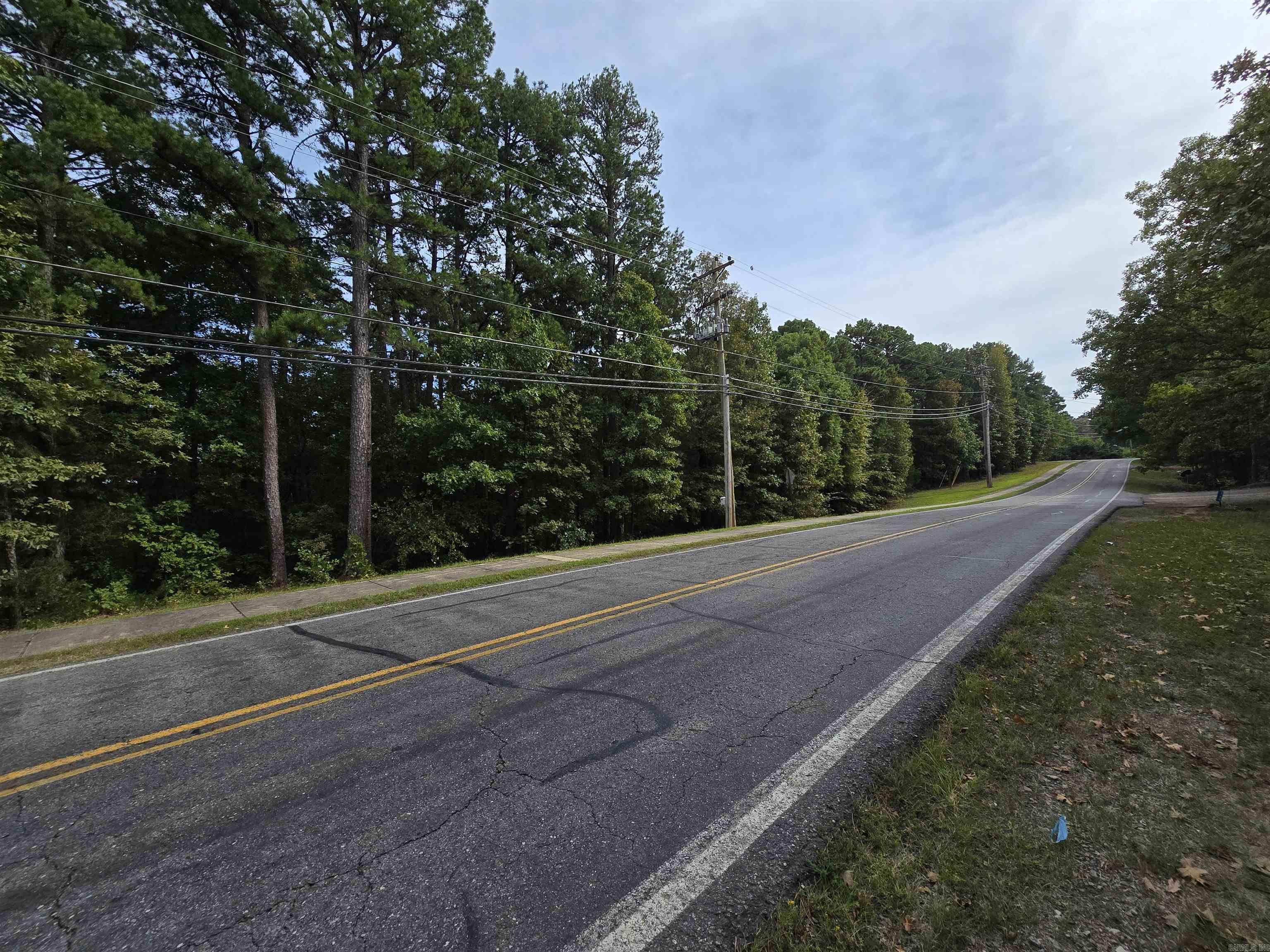 Discover the perfect opportunity to create your dream home or weekend getaway in the charming Ozark lake town of Fairfield Bay, Arkansas. This residential lot provides plenty of space to design and build the home you've always envisioned. Situated just minutes away from the Fairfield Bay Marina and Greers Ferry Lake, you'll have access to endless water-based activities such as boating, fishing, swimming, Fairfield Bay also offers 3 communities pools, mini golf, bowling, pickleball, tennis, restaurants, hundred miles of ATV & hiking/biking trails and so much more Embrace the tranquil atmosphere and breathtaking natural beauty of the Ozarks as you design you forever home or plan your weekend retreat. Don't miss out on the chance to be part of this lake town community, where the beauty of nature merges seamlessly with modern amenities and a relaxed lifestyle. Possible owner finance