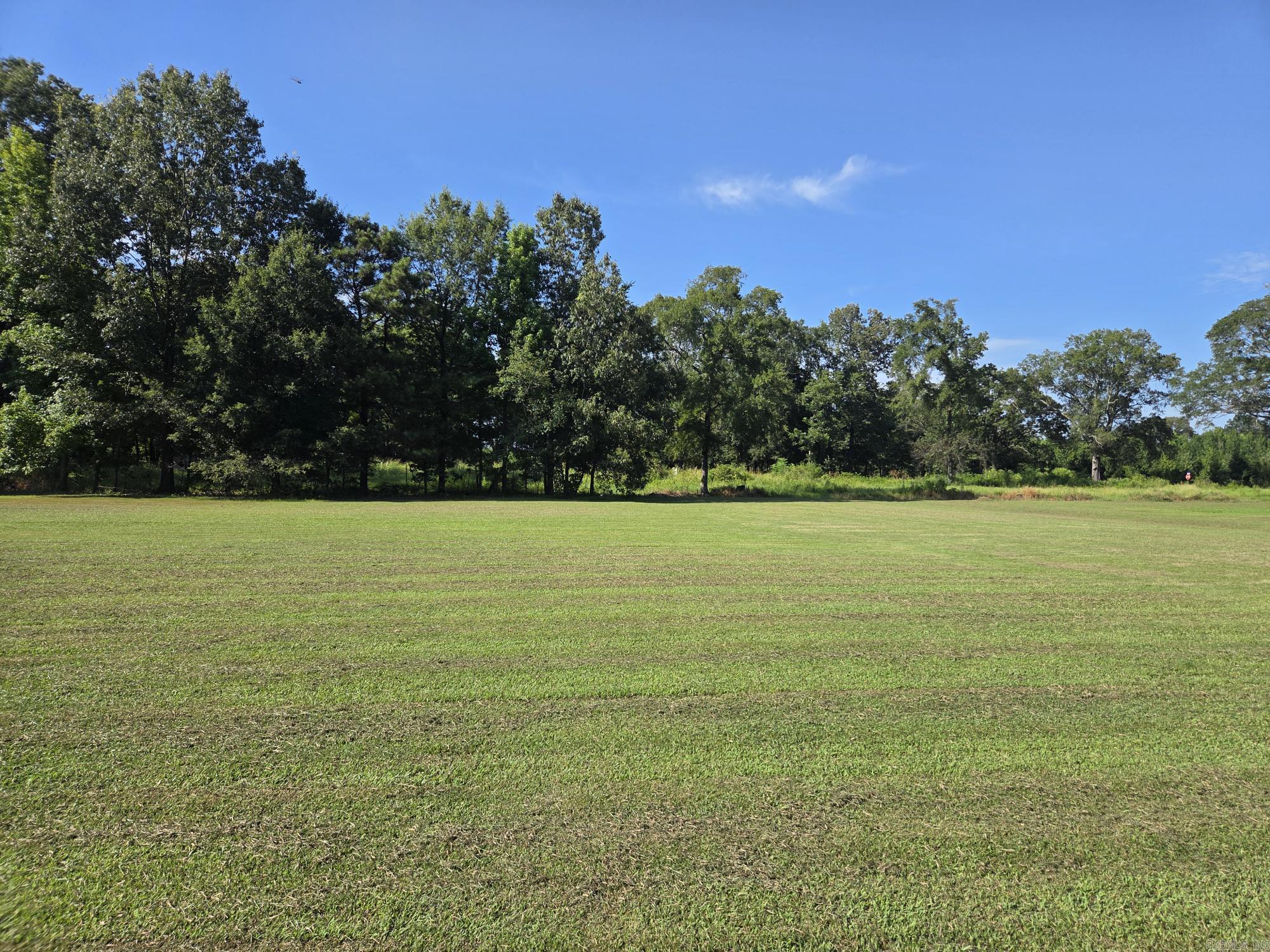 Nice level cleared building lots with city sewer & water available. Electric is at the paved road as well. There is a culvert & are ready to build your house or set a mobile home. Enough road frontage to install or build two homes.
