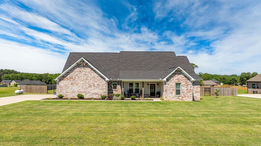 Stunning newer home on 1.40 acres with 4 bedrooms and 2 bathrooms with 2415 square feet of living space is the perfect blend of comfort and luxury.  As you step inside, you will be greeted with soaring vaulted ceilings in living room. The kitchen creates an open and inviting atmosphere and  features stainless appliances, gas stove, pantry and beautiful granite countertops, that continue throughout the home.  The bedrooms are spacious with walk-in closets designed to provide comfort and privacy for you and your family.  The bathrooms feature high-end fixtures and luxurious finishes adding a touch of elegance. The beauty of the home does not stop there, luxury vinyl plank flooring throughout the home add an extra layer of sophistication, while the beautiful back porch and huge back yard are the perfect place to unwind after a long day. Call for your private showing today.