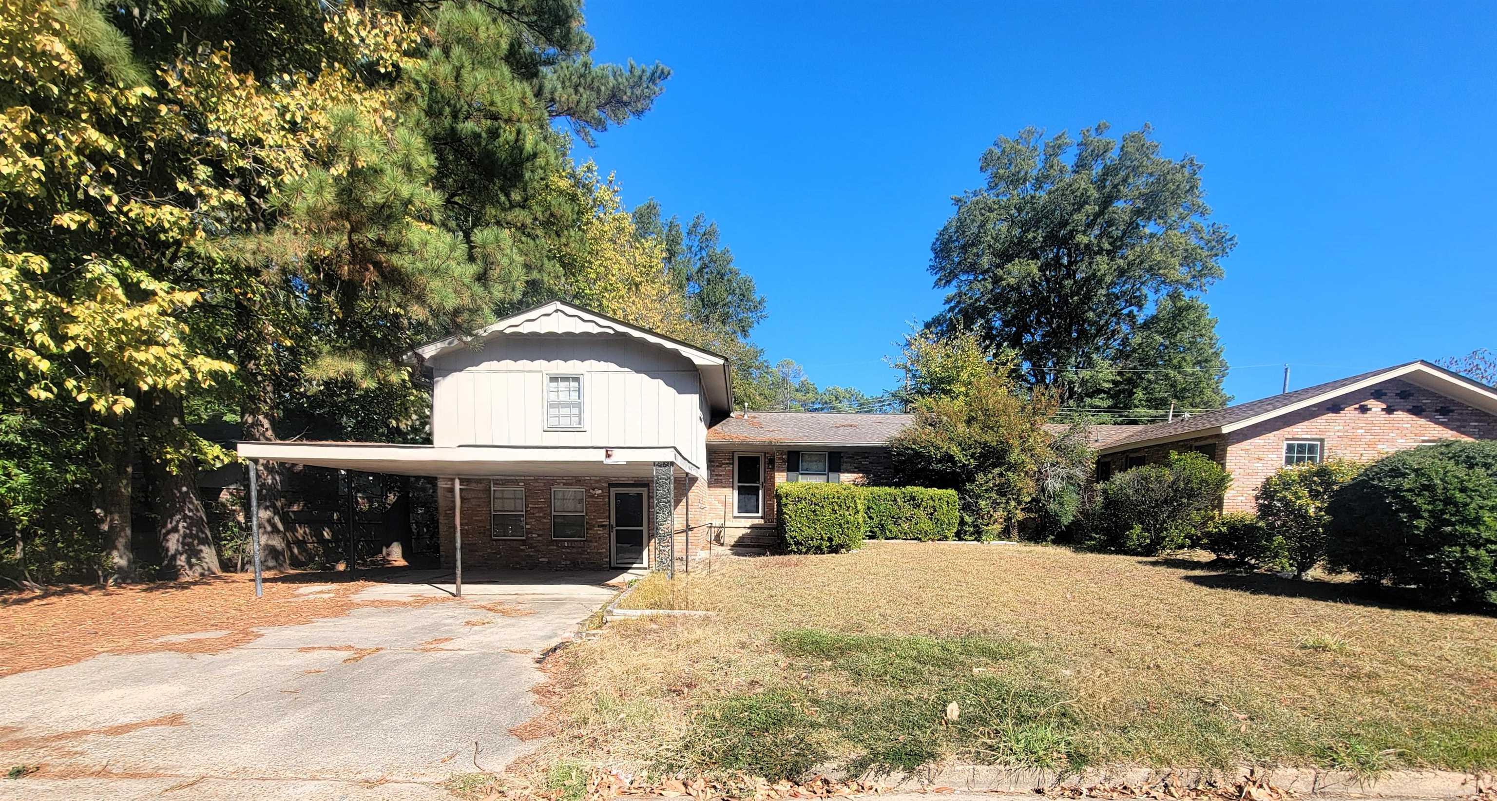 This spacious tri-level home is conviently located in Pine Bluff City limits near the Pine Bluff Country Club! Could possibly be a four bedroom with the additional space located on the bottom level! There is a safe room built in with fesh air access! Beautiful back patio with a privacy fence surrounding the back yard!