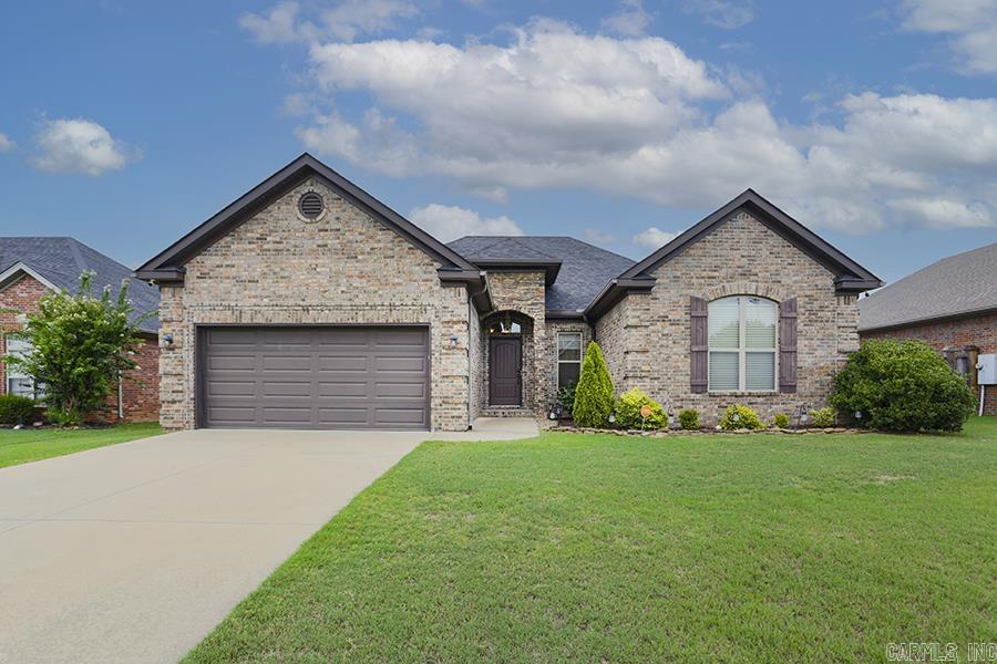 Text 6469209057 for a showing! This beautiful spacious 3 bedroom 2 bathroom home is situated in one of the best locations in Maumelle - County club of Arkansas! It is close to shopping, dinning and schools, it is easy access to highway and other major roads. Popular open floor plan features high ceilings, gorgeous hardwood; kitchen offers granite countertops, stainless steel appliance and island; the master bedroom is oversized with tray ceiling, master bathroom is equipped with double vanities, tiled shower and jacuzzi bathtub; fully fenced backyard with covered patio is perfect for family entertaining. Listing company does not represent the landlord.