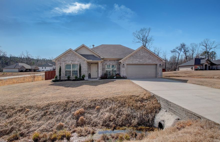 Located just north of the Avilla community, this home is at the back of wonderful Pinewood Estates. Off Congo-Ferndale road, it's within a short drive of western LR without the headache of all the interstate craziness. The sellers have fenced in a nice size yard with a warmly stained 6' wood privacy fence. The yard comes with an above ground pool and storage buiding. The home features a living room which has 10' ceiling, w/b fireplace, & is open to kitchen. Kitchen has custom cabinets w/ez-close drawers, granite counter-tops & s/s appliances. Crown molding in all rooms. Hardwood floors in LR, kitchen, dining, & hall. Ceramic tile floors in baths & laundry. Carpet in BRs. Split floor plan. Master BR has tray ceiling. Master bath has sep. shower, soaker tub, & a large closet. Large secondary BR. Laundry room w/storage. AT&T fiber currently provides a high speed internet experience and the buyer could have an option with Connect2First. Approx 0.78 acre lot. In the award winning Bryant School District. Come make this your new home! Agents see remarks.