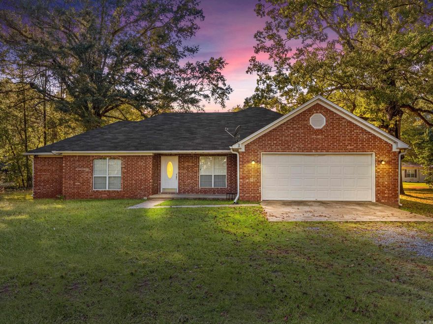 Welcome to this inviting 3-bedroom, 2-bath home nestled on a full acre just outside city limits. Inside, you’ll find a thoughtful floor plan with laminate flooring flowing through the kitchen and guest bedrooms, durable tile in all wet areas, and plush carpet in the private primary suite. The spacious primary bathroom is designed for comfort, featuring a double vanity, jetted soaking tub, walk-in shower, and an oversized closet. Also, BRAND NEW HVAC! Natural light fills the main living areas, creating a warm and welcoming atmosphere. Step outside to enjoy the large backyard, fully enclosed with a 6-foot wooden privacy fence—perfect for pets, play, or entertaining guests. With plenty of outdoor space, you’ll have room to garden, relax, or simply enjoy peaceful country living while still being close to town. This home combines comfort, convenience, and room to grow, offering the best of both worlds. Don’t miss the opportunity to make it yours—schedule your private showing today! Agents see remarks!