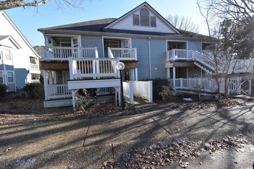Discover your perfect Ozark Mountain escape with this beautifully updated studio condo nestled in the serene woods. Located on the lower floor for easy access, this gem is framed by large bay windows, providing an abundance of natural light and a spacious feel. The interior has been thoughtfully revitalized with updated flooring and a fresh, modern color palette, ensuring that the space is both inviting and contemporary. Every inch of this studio is optimized for comfort and convenience. Enjoy the convenience of a full-size washer and dryer, making extended stays easy and pleasurable. Step outside onto the back deck, where you can relax and soak in the tranquil views of the surrounding forest—a perfect spot for your morning coffee or evening unwind. Beyond the condo, Fairfield Bay offers an array of resort-style amenities to elevate your lifestyle, including three sparkling swimming pools, two championship golf courses, and easy access to the stunning Greers Ferry Lake for endless outdoor adventures. Whether you are looking for a serene retreat, a comfortable full-time residence, or a lucrative investment property, this studio condo stands ready to meet your needs.