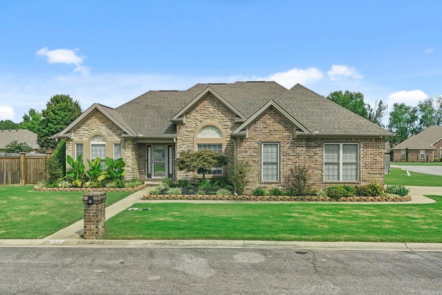 Beautiful home on corner lot with privacy fenced back yard, sprinkler system, large covered back porch, deck and a large storage/detached garage with electricity.  Open kitchen/living combo, large breakfast area, bar, plus formal dining room.  Large bedrooms with walk in closets. Split plan with several updates: HVAC, new paint, granite countertops, wood flooring, carpet, tile backsplash (kitchen and primary), stainless appliances, safe room in garage, security system/cameras, deck and landscaping. New roof coming!