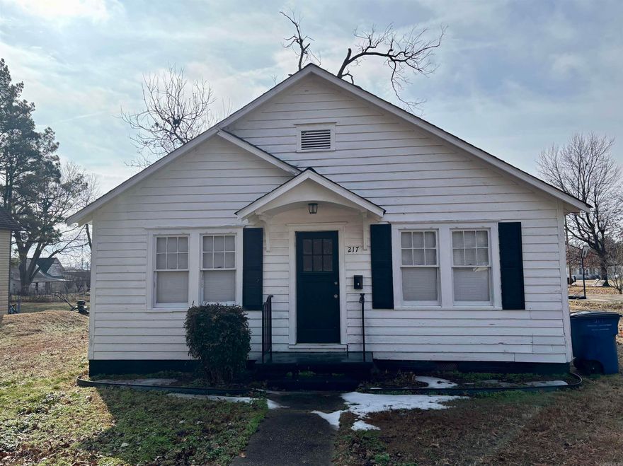 This 2 bedroom (could be 3) and 1 full bath home sitting in the heart of Rector is move in ready!  Roof was replaced just a couple years ago and the exterior was painted last year.  There is a room off one of the bedrooms that could be used for a third bedroom or office.  There is a formal dining room and spacious living room.  Call today for more information or to schedule your private tour.