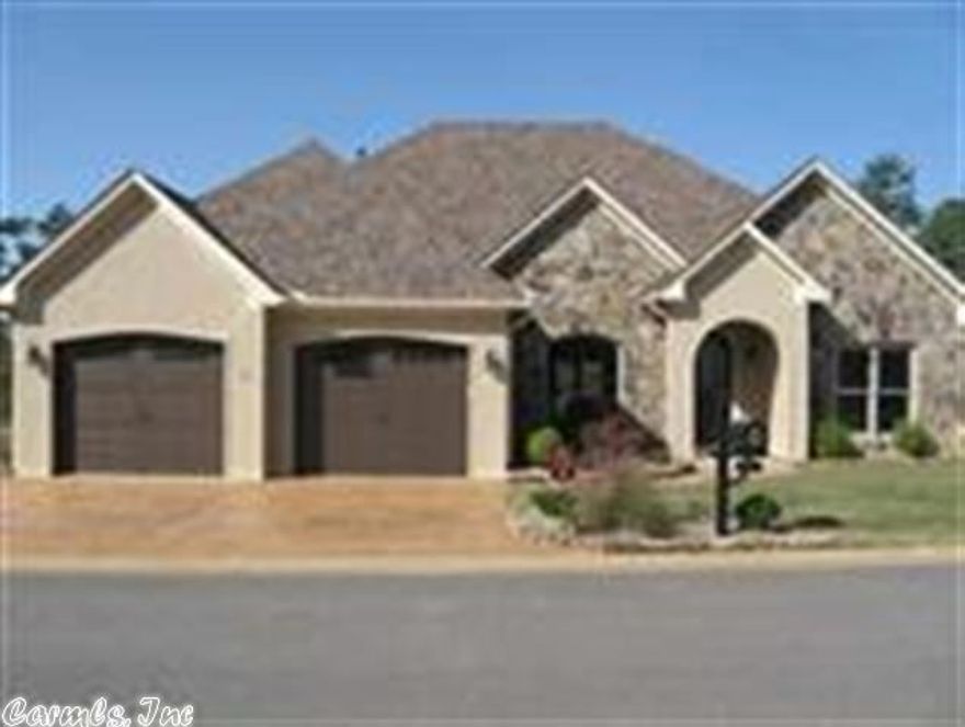Located in Searcy's gated community, the Dominion, this beautiful home offers 2500 sq.ft.. An open floor plan with entertainment-size living area featuring gas log fireplace. Spacious kitchen, abundance of walnut stained cabinetry with circular breakfast bar & granite counter tops. Separate dining features 12 ft. ceilings with textured walls & arched doorways. Master suite features tray ceilings, master bath features jacuzzi & tiled  shower, double vanities. Covered patio. See remarks.