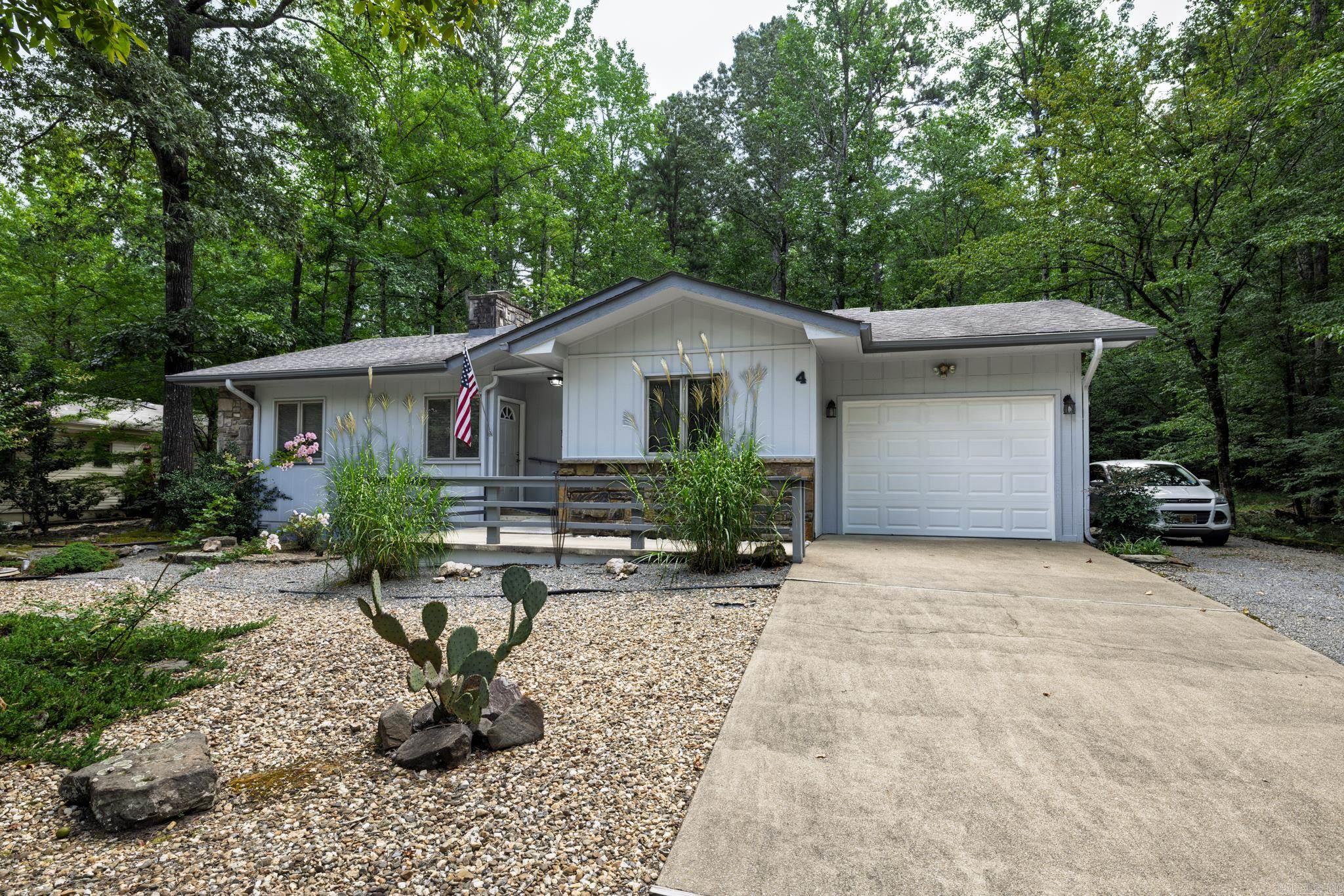 Very well maintained, move in ready home. 3 bedrooms and 2 full baths. Updated primary bath has walk in shower and guest bath has a tub/shower combo. Kitchen/dining/living semi open floor plan with breakfast bar. No popcorn ceilings, luxury vinyl plank flooring throughout, wood burning fireplace, 15'x15' heated and cooled sunroom with vaulted ceiling. Nice deck off the sunroom. Single car garage with extra parking space to the side. Roof replaced in 2018. The internet provider is Hyper Fiber. This home is located on a quiet cul de sac with common property to the rear and a vacant lot on one side.