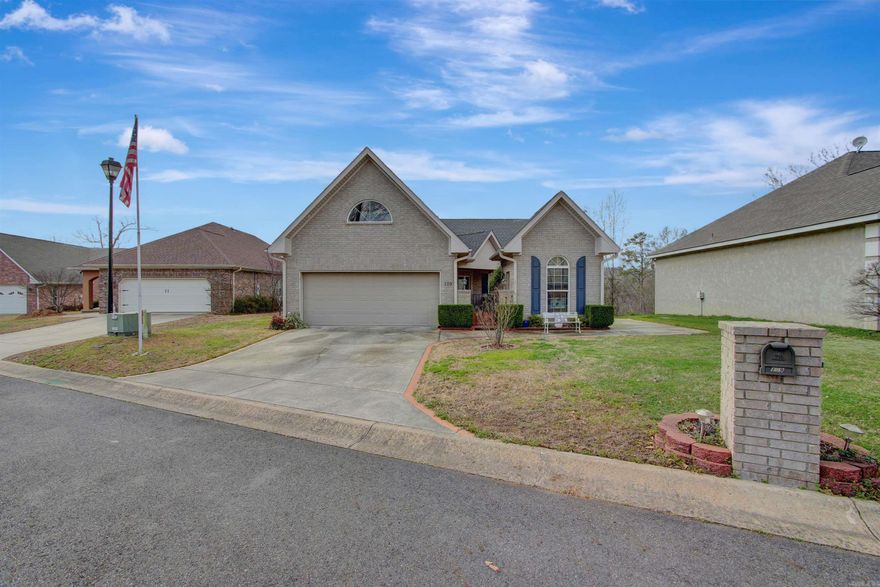 Just what you have been looking for ...a stunning custom-built home with all of the upgrades & incredible lake views! From the moment you walk through the gate you will enter a private courtyard with a relaxing trickling waterfall. Inside the home you will be greeted with a warm and inviting open living /dining room with hardwood floors, tray ceilings, crown molding, modern style gas fireplace & custom-made sliding TV doors to conceal your TV. Kitchen is stylish with stainless steel refrigerator, dishwasher and oven, quartz counters and a walk-in pantry. In the large master bedroom, you will enjoy lake views and master bath with jetted tub & separate shower. The guest a comfortable pull-down murphy bed. In the 2 car garage there is a stair way to heaven (attic with abundant storage) Separate  brick golf cart/small utilities storage building. And the best is yet to come...Covered tiled deck with remote control screens overlooking the lake with specular views! Located in Diamondhead Resort Community with lots of fun activities...boating, fishing, golfing, tennis, basketball & pickleball, clubhouse with community activities. Only minutes to Hot Springs & Lake Catherine State  Park.