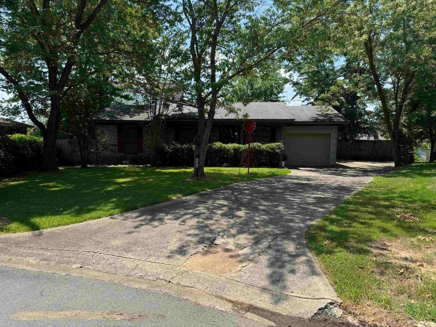 Don't miss out on this well maintained home is situated on a quiet cul de sac near major shopping amenities and restaurants. All brick exterior with a shop that even has electric. Beautiful privacy fenced yard with shade trees for relaxing. Fresh interior paint so you can move right in. Original hardwood floors in main living and bedrooms. Screened in carpeted porch for grilling and dining without the hassle of bugs. This home won't last long. Schedule your showing today! See agent remarks.