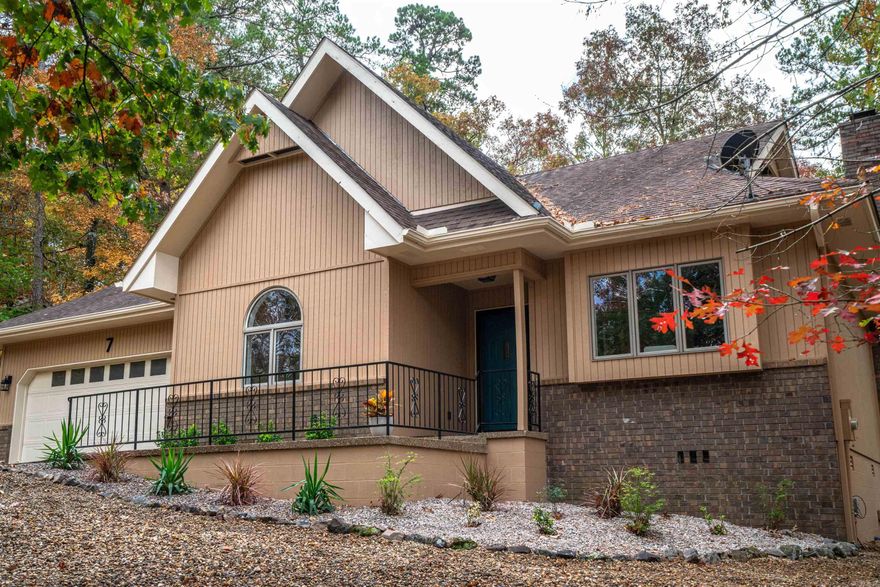 This home is a real beauty "like new" with numerous improvements. Starting with the outside painted in Sept '23. You will love the quiet cul-de-sac!  NEW open floor plan with vaulted ceiling, living, dining and kitchen area.  The amazing kitchen has new stunning granite countertops and white soft close cabinets, 44-bottle wine cooler, large sink!  The newer Gallery series oven combination functions as a convection oven or an air fryer.  Separate pantry and plenty of storage. The coffee bar area features glass front cabinets. The primary bedroom suite has volume ceilings and 2 closets. The recently remodeled bath is beautiful with granite countertop. Shower has barn-style glass shower door w/bench. 2 separate guest bedrooms, One has an adjoining bath one would make great office space. The backyard is perfect for sitting around the firepit, the firewood is already there for you to use.  Relax on the patio deck and when it's too chilly to sit outside, then enjoy the warmth of the cozy wood fireplace in the living room. A hiking trail, accessible from the backyard connects to the Woodlands and beyond! NOTE: OPEN HOUSE SAT NOV 11th 11am-2pm    AGENTS SEE REMARKS