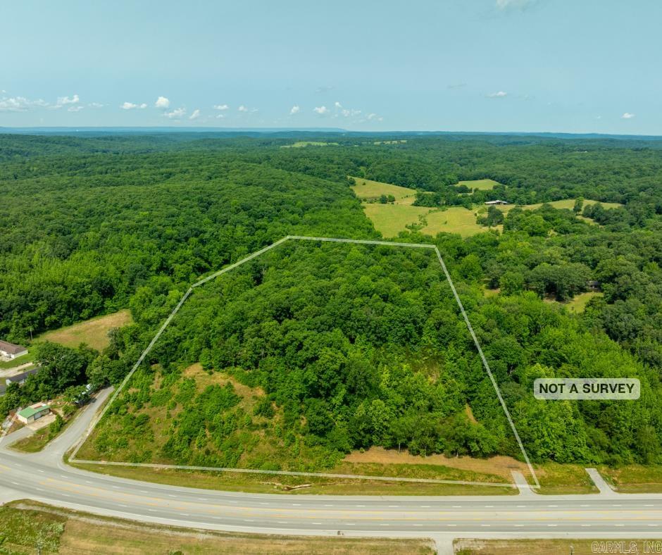 14.39 Acres with Utilities & Commercial Frontage – Just Minutes from Batesville, AR. Discover the perfect blend of privacy, accessibility, and opportunity with this 14.39-acre property located just outside Batesville, Arkansas. With all utilities already on site and established internal roads, this land is ready for whatever you envision—whether it’s a scenic homestead, a recreational getaway, or your next commercial venture. Positioned with approximately 670 feet of commercial highway frontage, you can place your business right off the road while building your home tucked back in the trees, where elevated views stretch for miles. The gently rolling terrain offers multiple build sites and tons of usable space. Property Features: 14.39 Acres City Water & Electric On-Site Internal Road System – Easy access throughout Three Gated Entrances for privacy and security Commercial Frontage – Ideal for a business or live/work setup Short drive to Batesville’s shops, dining, and schools Perfect for building, development, or recreation This is a rare chance to own a large, utility-ready parcel in a high-potential area.