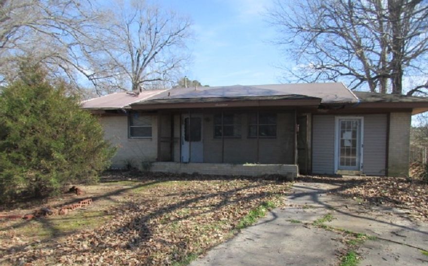 Dead end street. Large back yard, partially fenced, Garage has be converted to living space.  **AGENTS SEE REMARKS**