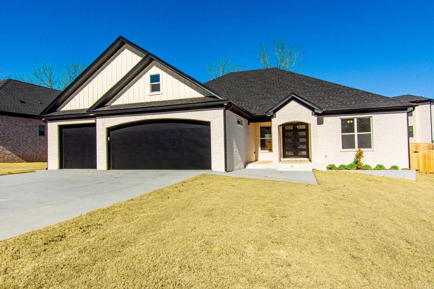 Amazing new construction, this one has your 3 car garage you've been looking for! Open floor plan with tall ceiling and so many extras!! The custom kitchen has a 5 burner gas cooktop, double oven, large granite island and builder already installed a refrigerator! This open floor plan is perfect for entertaining, also has half bath in hallway for guests! Do you have large master furniture, well this master suite is huge, has custom ceiling, extra trim, soaker tub, walk-in shower, double vanities and an amazing closet with access to laundry room with extra storage and folding area. Another extra that everyone loves, is a walk up staircase to floored attic for easy storage! Tankless water heater, (you never run out of hot water), extra insulation in interior walls, garage door is even insulated! Call to make your appointment!