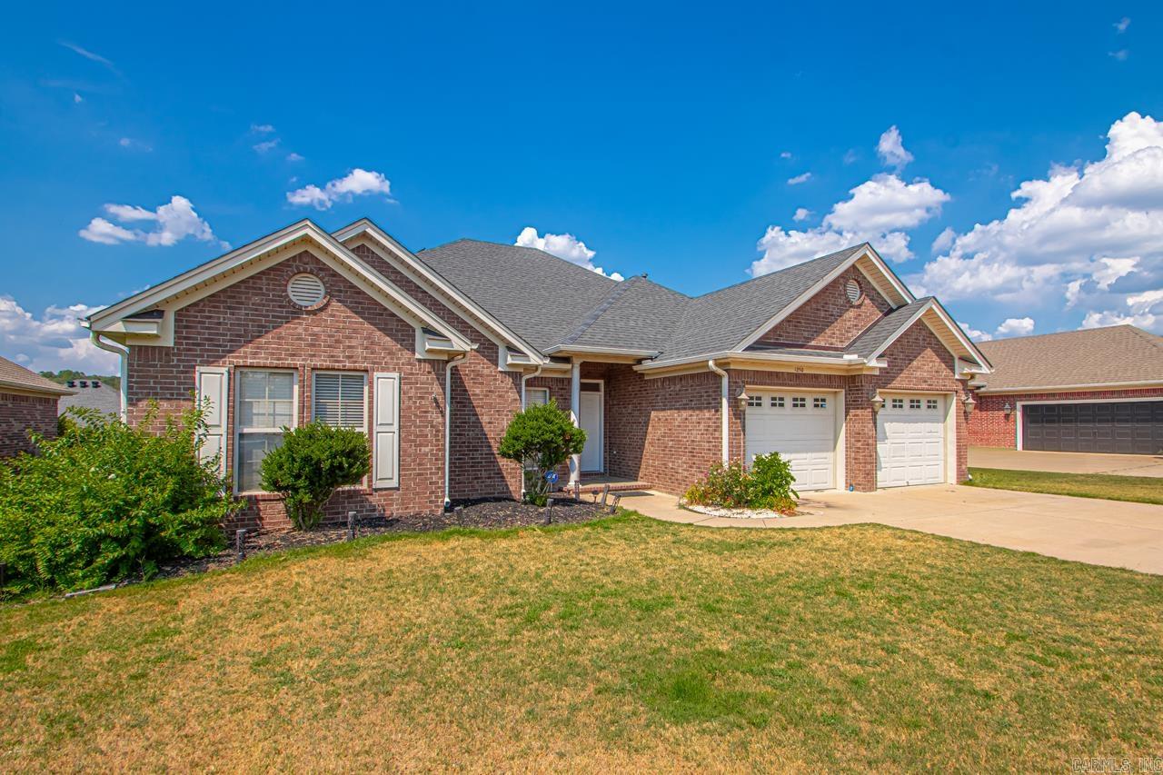 Welcome home to this warm and inviting 4-bedroom, 2-bathroom brick home in the North Hills Subdivision of Conway, AR. This spacious 2,329 sq. ft. home features a cozy gas log fireplace, perfect for relaxing. Recent updates include a new roof and new flooring in 2022, ensuring a fresh and modern feel. Solar panels installed in 2021 help keep energy costs low. An unfinished basement provides extra storage or potential for future customization. Outside, the fully fenced backyard offers a great space for outdoor enjoyment. Don’t miss the chance to see this well-maintained home—schedule your showing today!